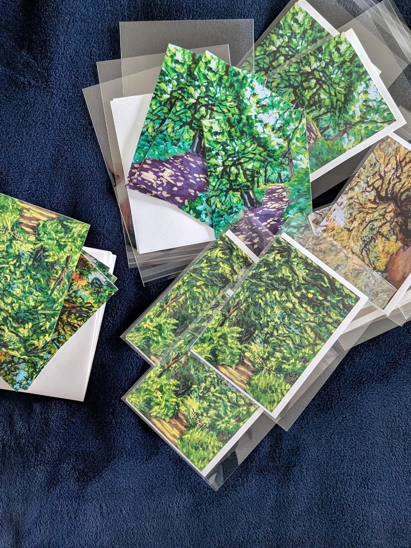 4 weeks until my first market...

Here's some snapshots of how I've been preparing the last few days:
1. Packaging greeting cards
2. Testing and selecting paper for my fine art prints
3. Preparing some canvases for some original art stock

What you d