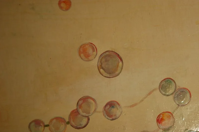 Painting of various-sized bubbles floating against a light beige background.