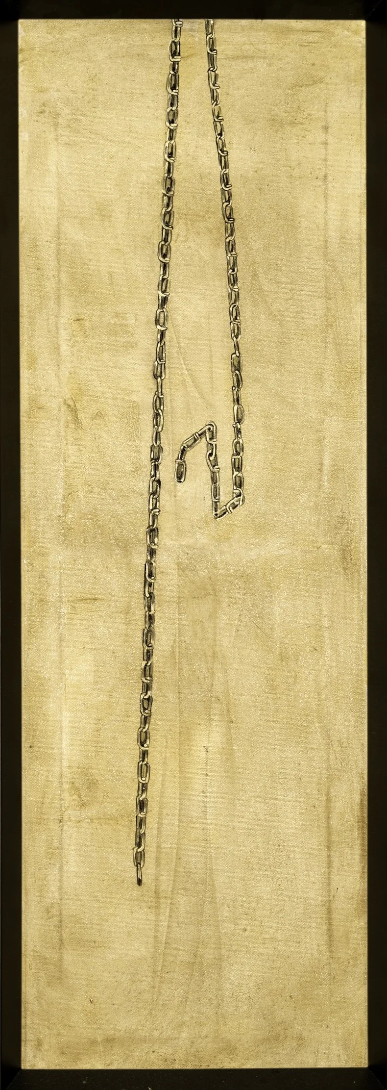 A chain hanging vertically on a wooden surface with a bent hook attached to it.