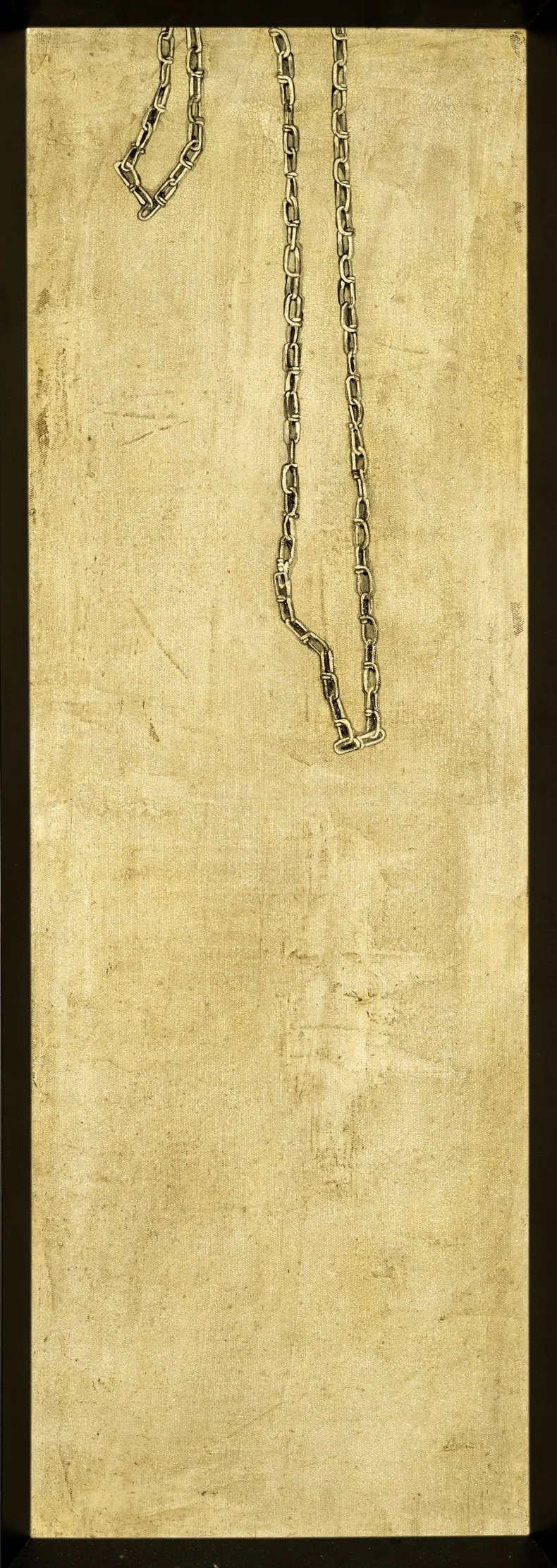 Three silver chains hanging on a beige textured background.