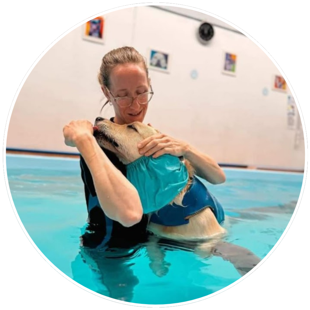water walkies staff member Jess, keeping a client calm and happy while building strength and confidence