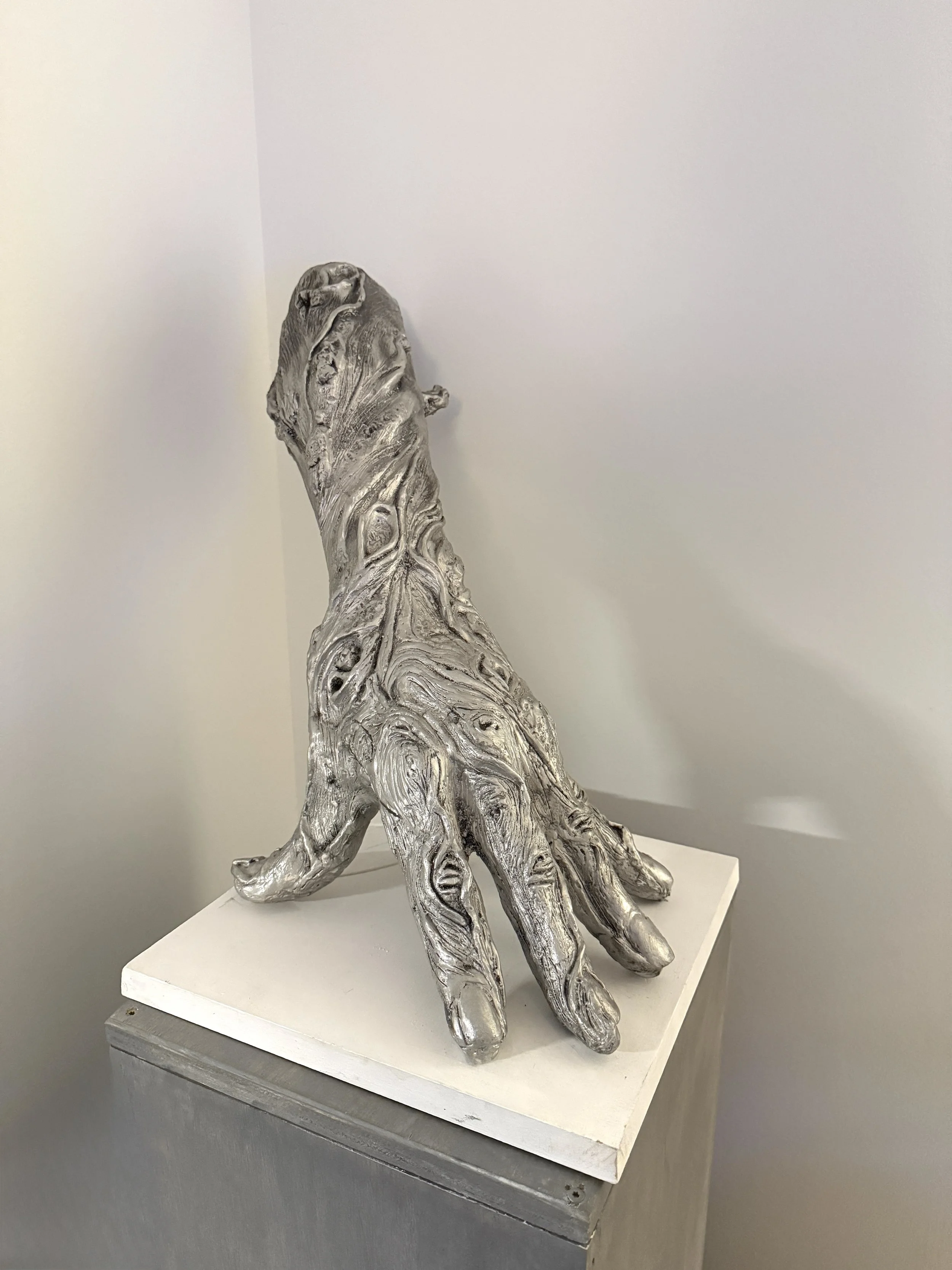 Refinement, 2015, 17"x18.5"x12", Cast Aluminum on mixed media base