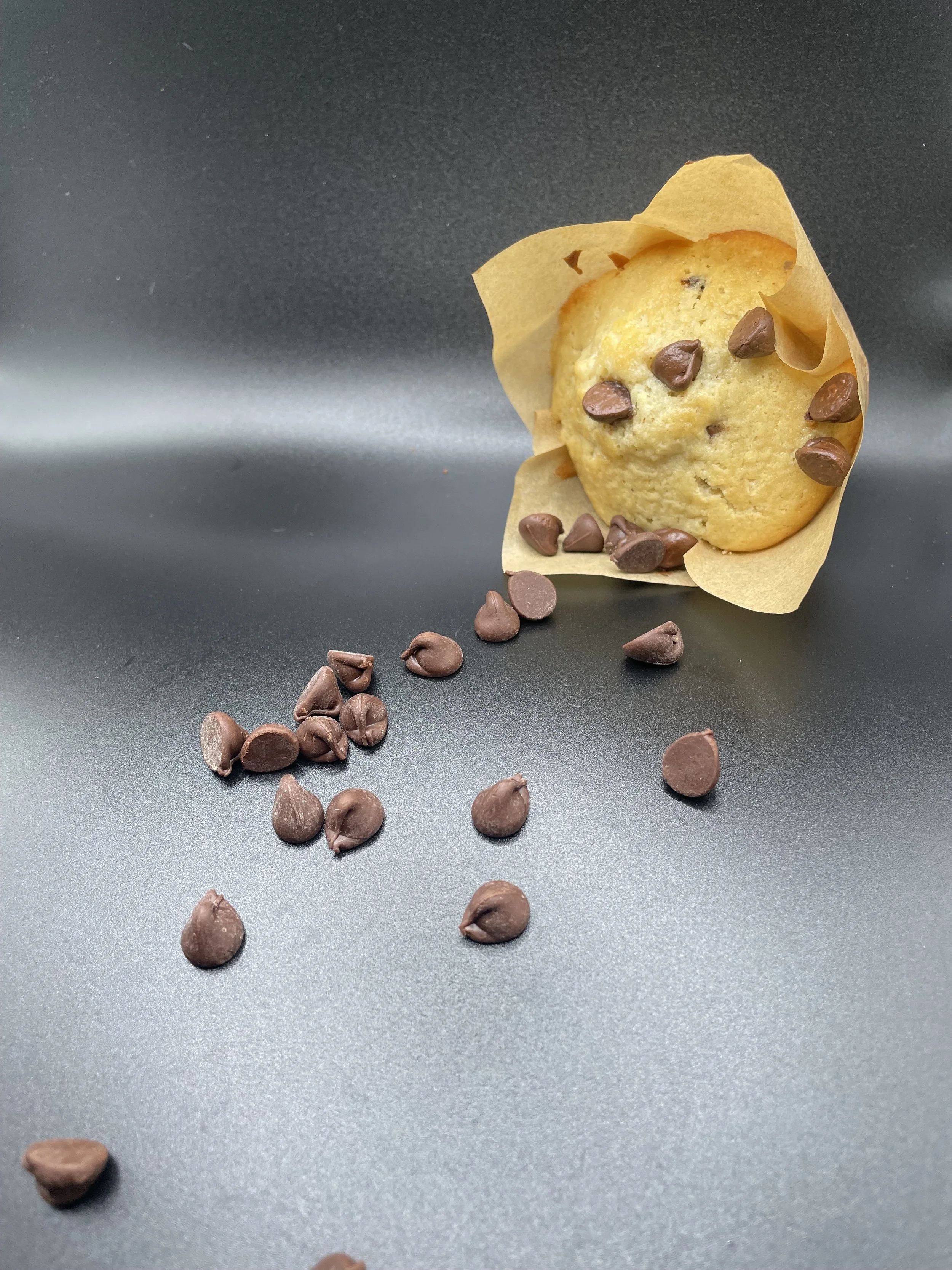 Chocolate chip muffin, where sweet meets simple.