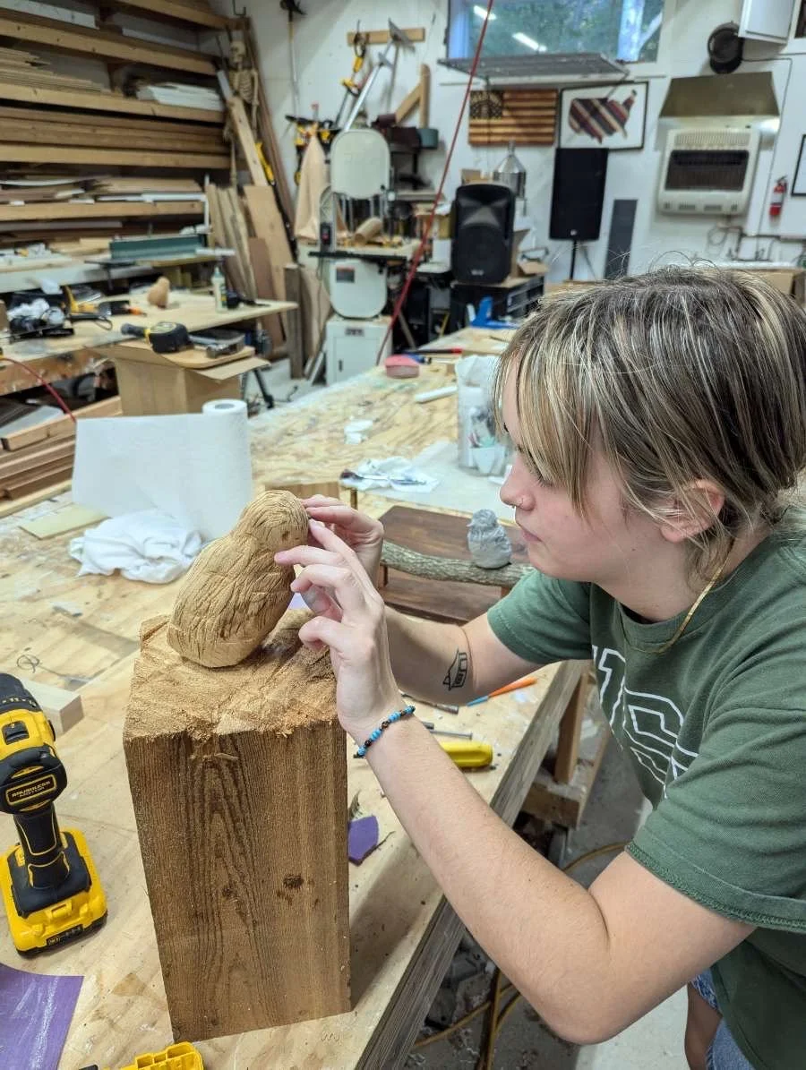 Carvings inset into design.