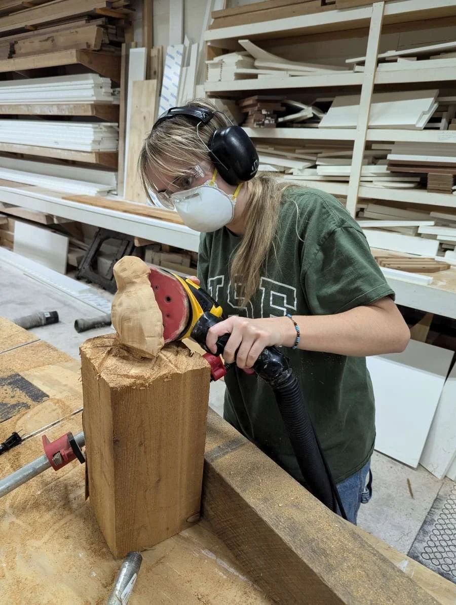 Beginning stages, carving and sanding from an initial block of wood.