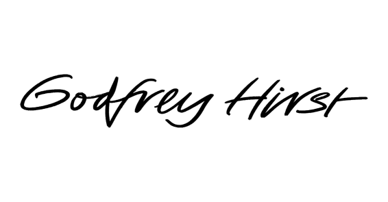 Signature of Godfrey Hirst in black cursive on white background.