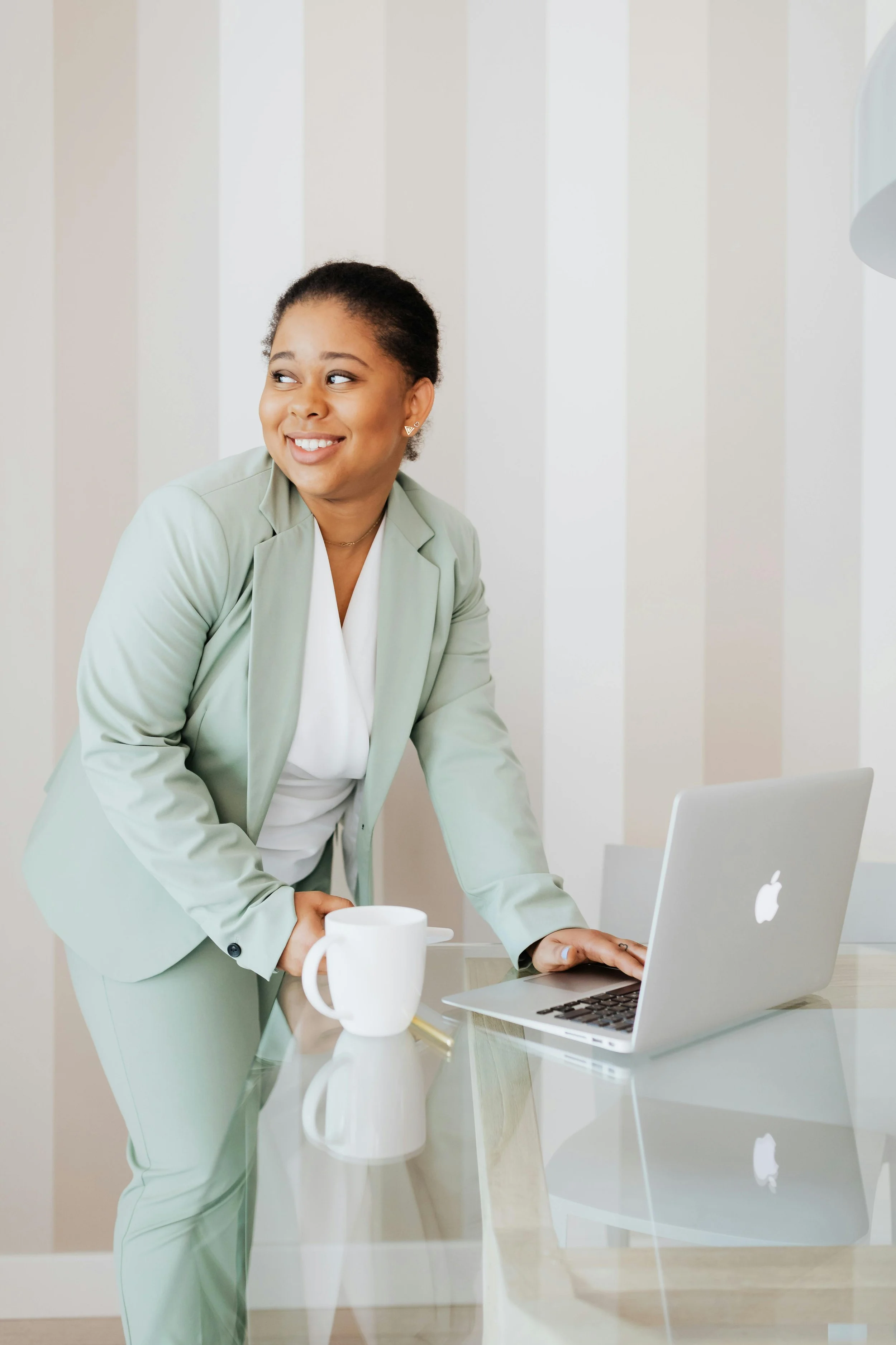 Woman smiling with her laptop