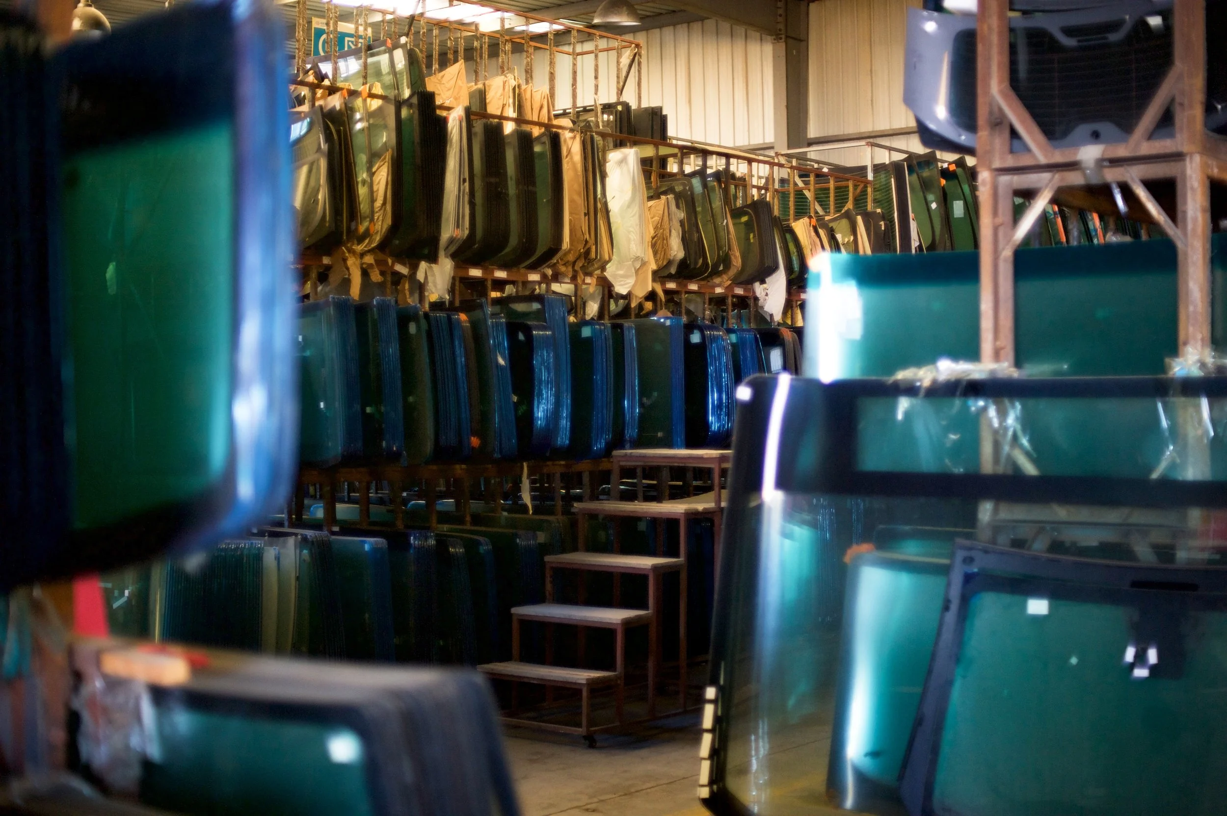 Specialized inventory of genuine Saint-Gobain auto glass for Tesla models, stocked in our warehouse and ready for global export.