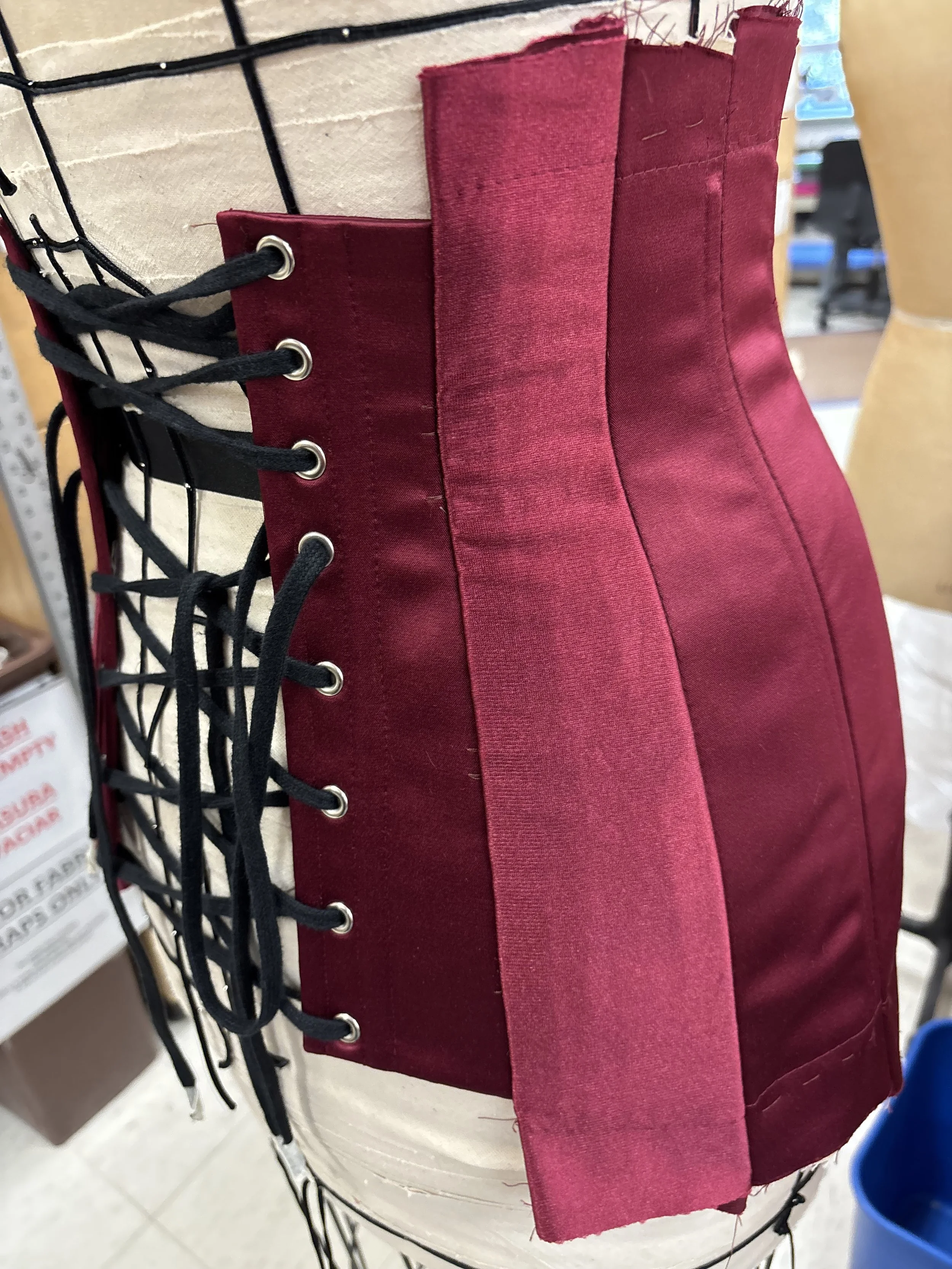 Corset back in process, stretch panel showcased