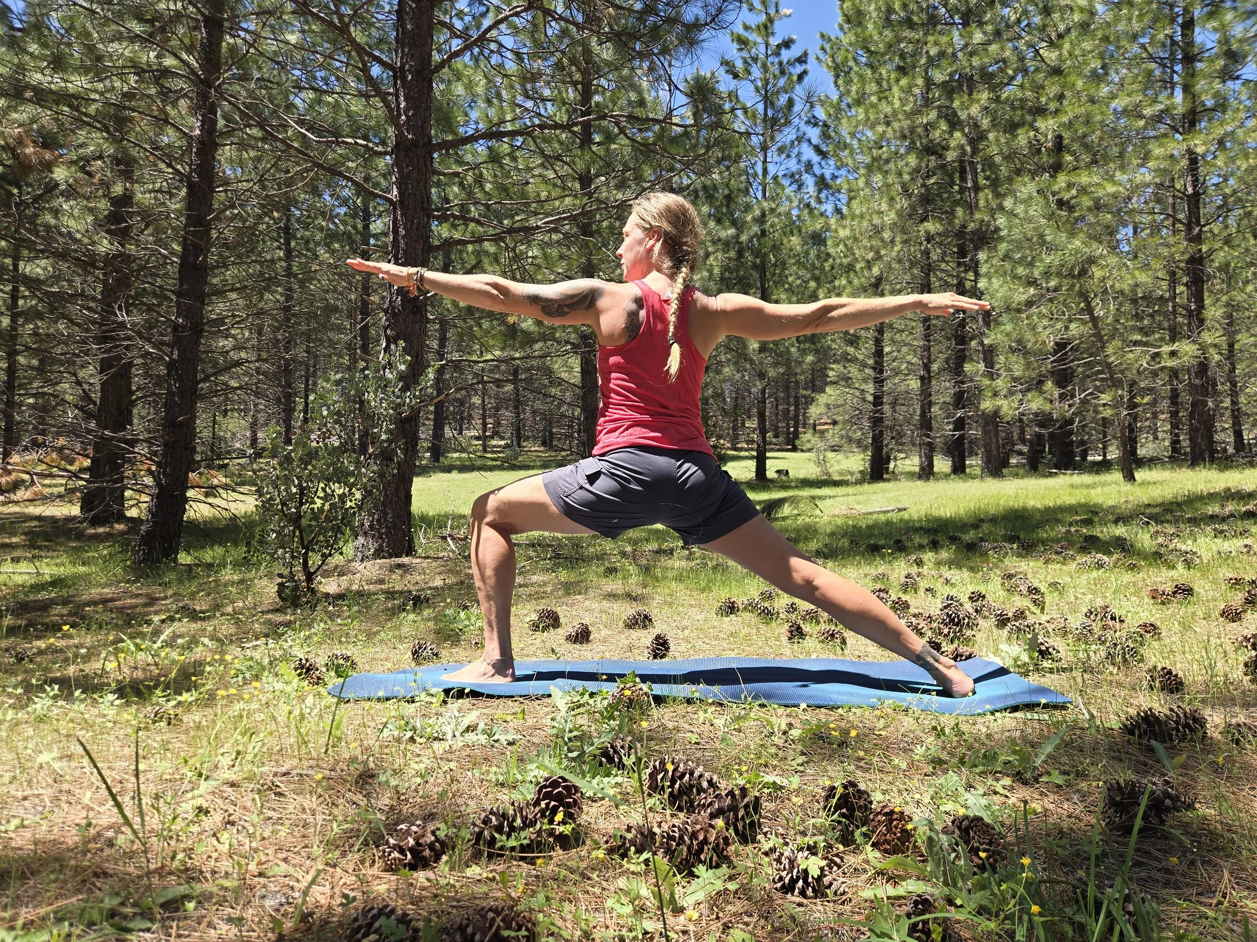 Michelle doing yoga, warrior two