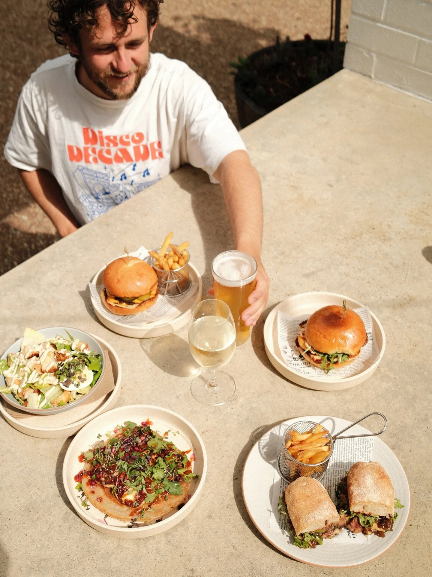 This is what good days taste like ~ ☀️

This table says it all&hellip; 🤤

Halloumi Paratha, Smash Burger, Steak Sanger, Caesar Salad and our Halloumi Burger &mdash; pair it with a cold one (or two) &amp; good company.

Come hungry. We&rsquo;ll take 