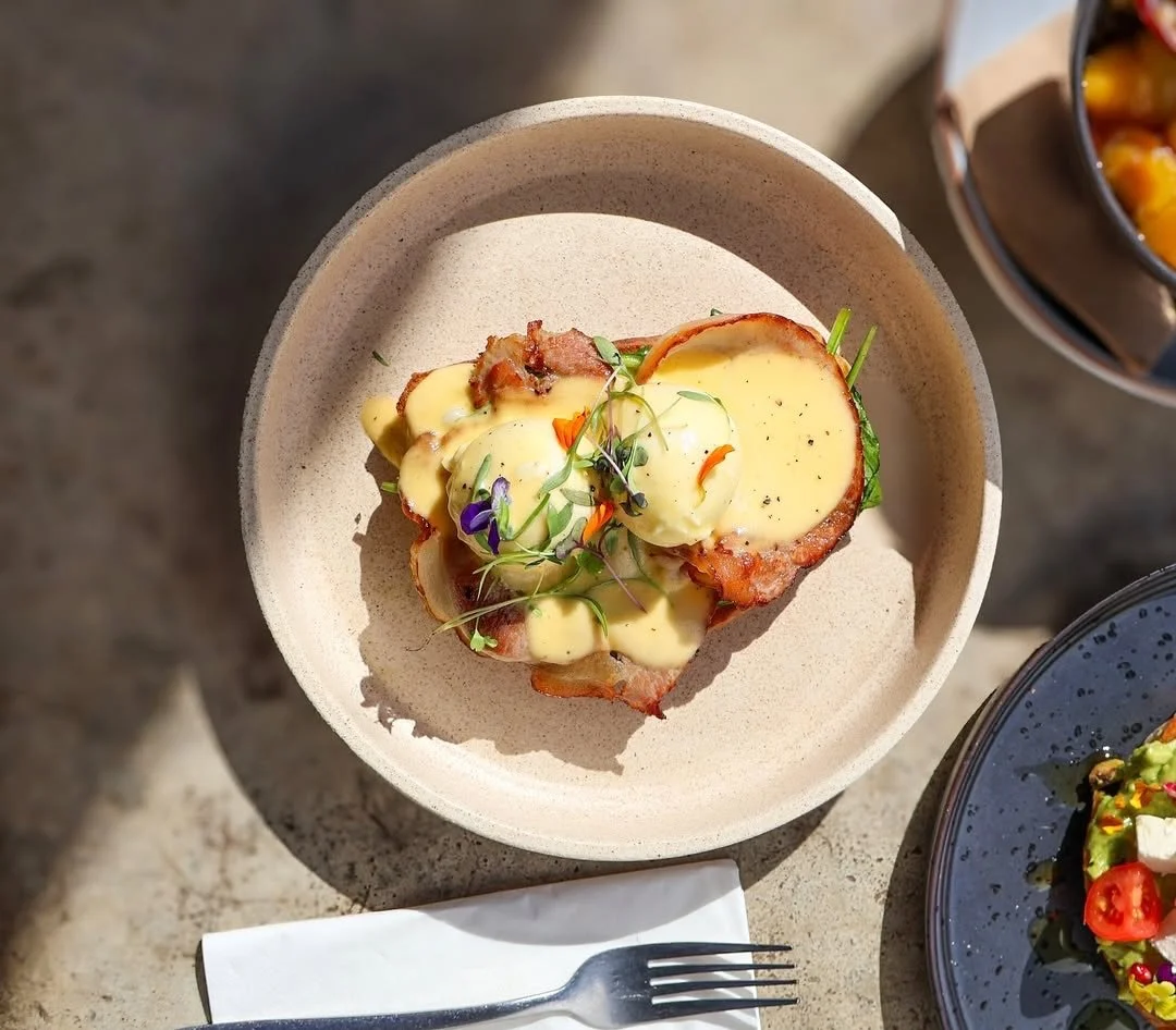 Sunny days call for good coffee and better brunch ~ 🌞

Start your Monday the right way!
Our classic Eggs Benedict, your way &mdash; spinach, salmon or bacon. 

Come &amp; grab a sunny spot on our terrace.🌿