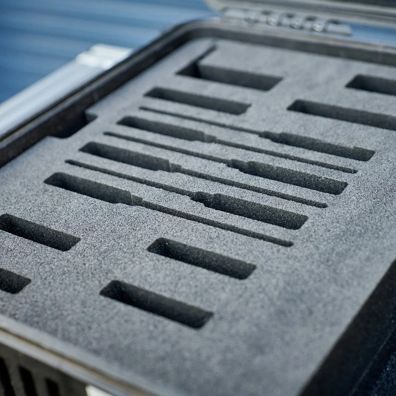 Multi-layer radio mic insert for a Pelican 1550