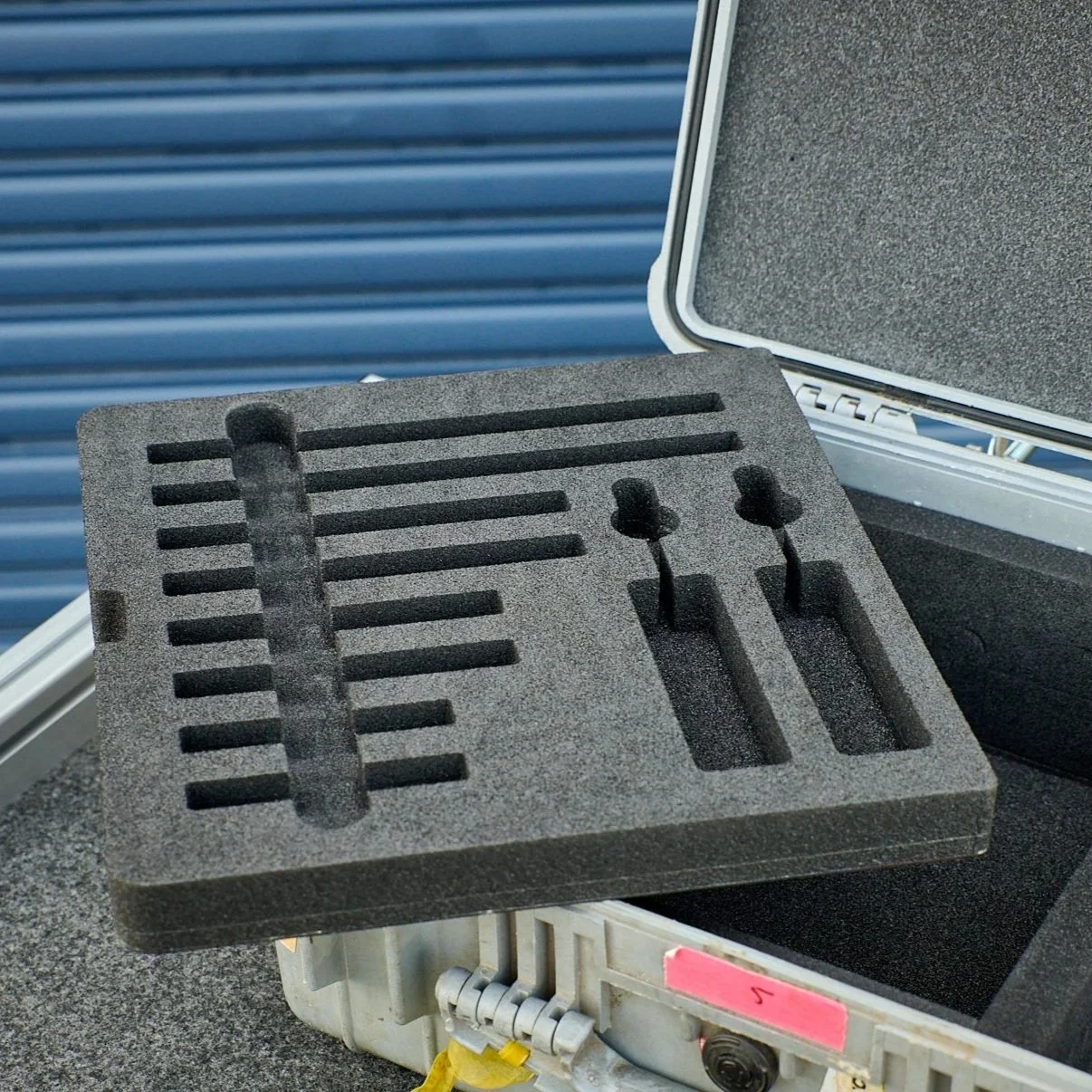 Multi-layer shotgun mic insert for a Pelican 1550