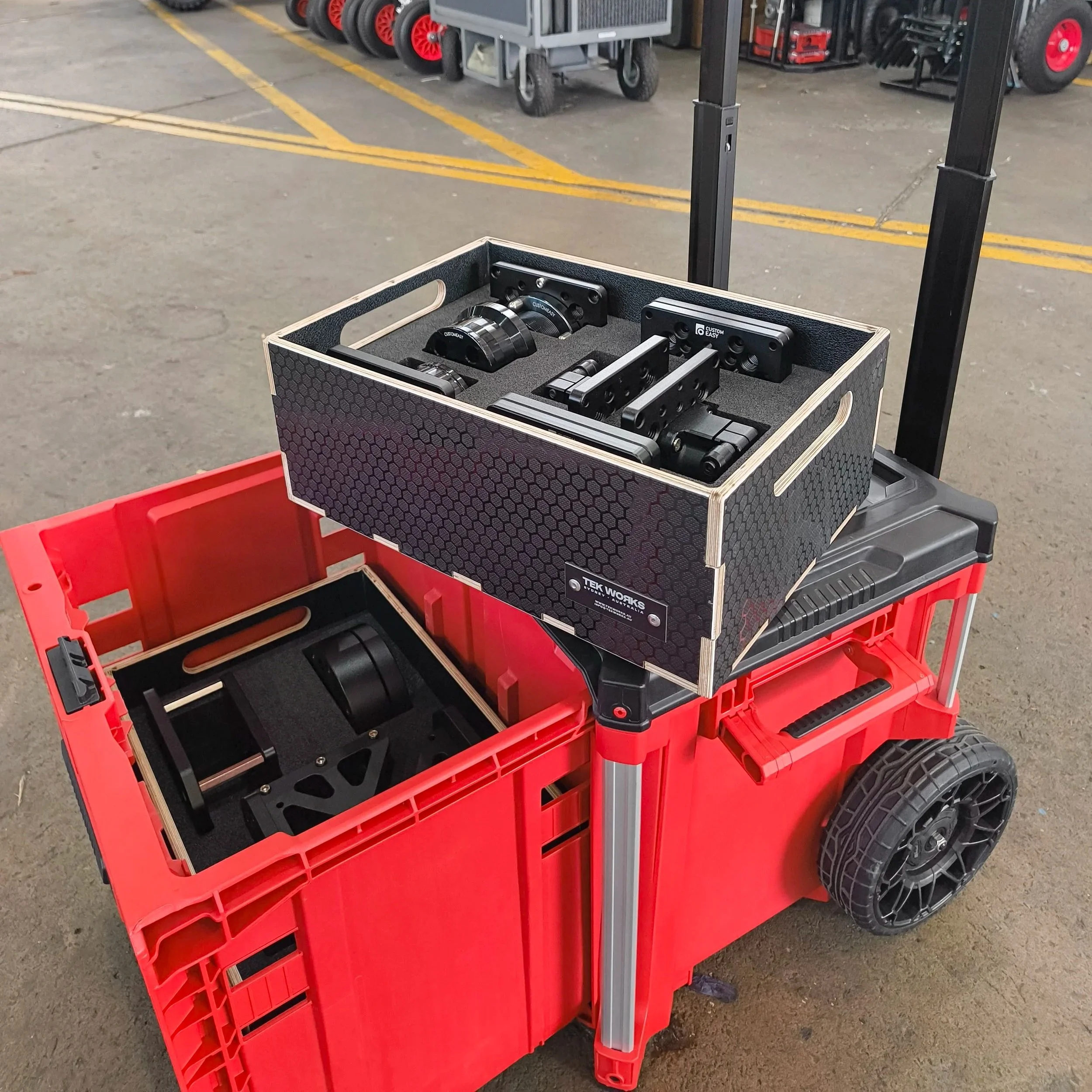 Custom trays holding ModTruss accessories in a modified Milwaukee Packout toolbox
