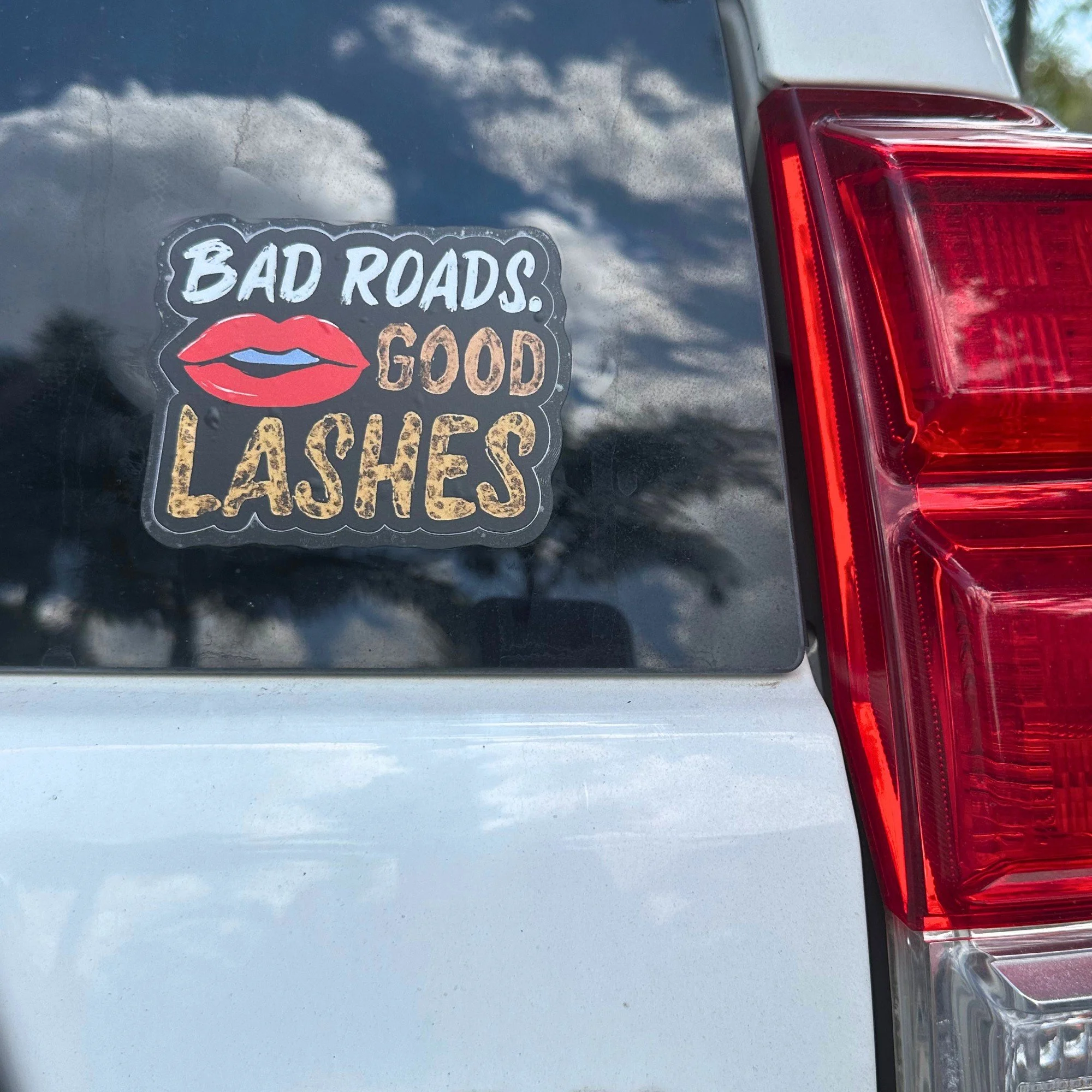 Bad roads good lashes vinyl car sticker with bold text design
