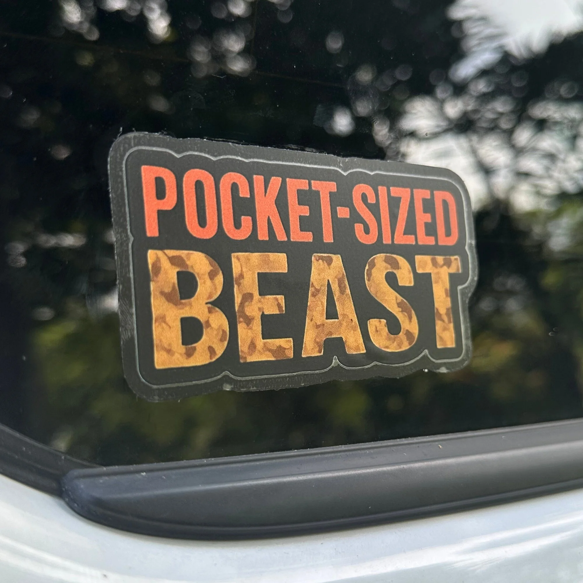 Pocket sized beast vinyl car sticker with bold compact text design