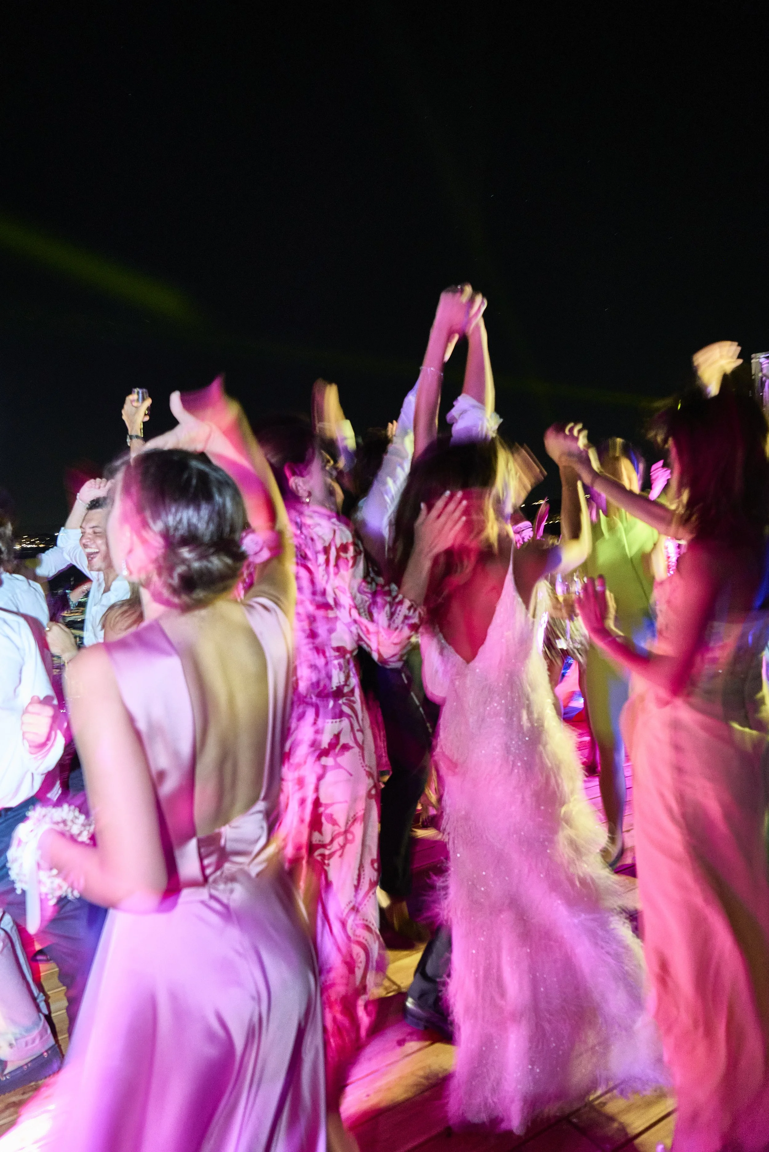 Dancing under the moonlight at a destination wedding in Italy