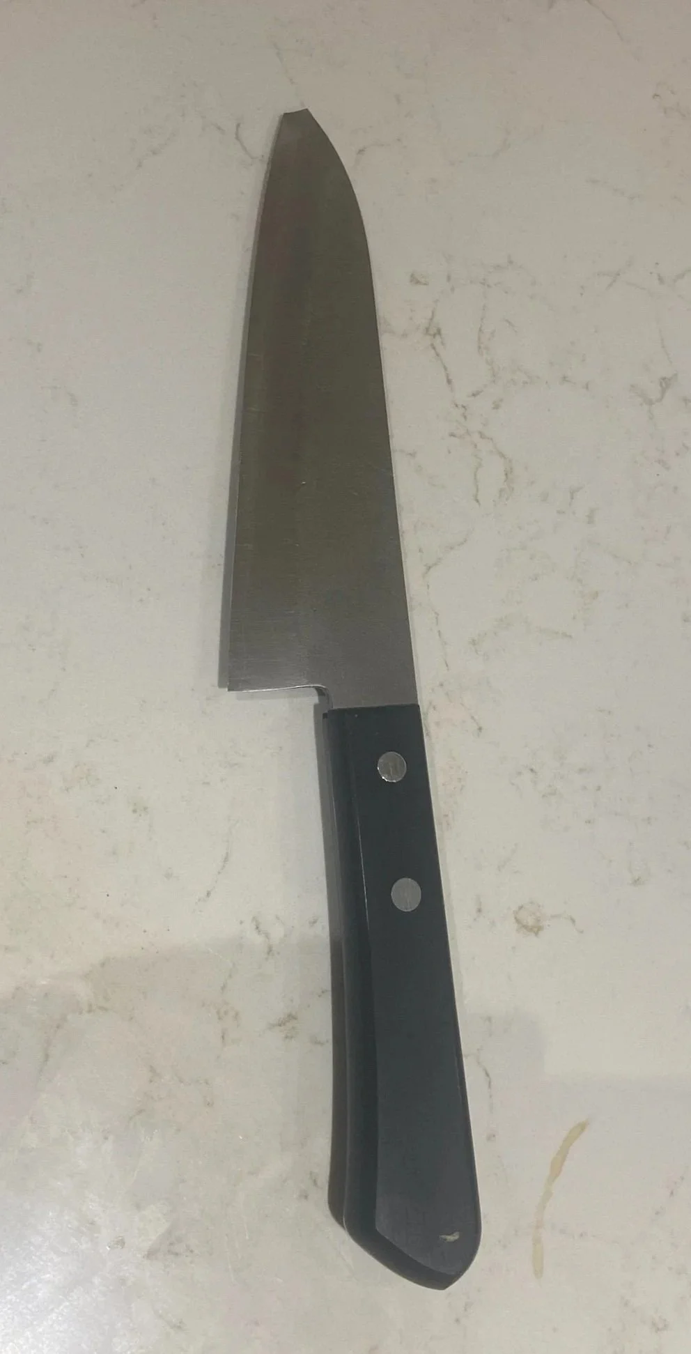 Kitchen knife ready to be re-tipped