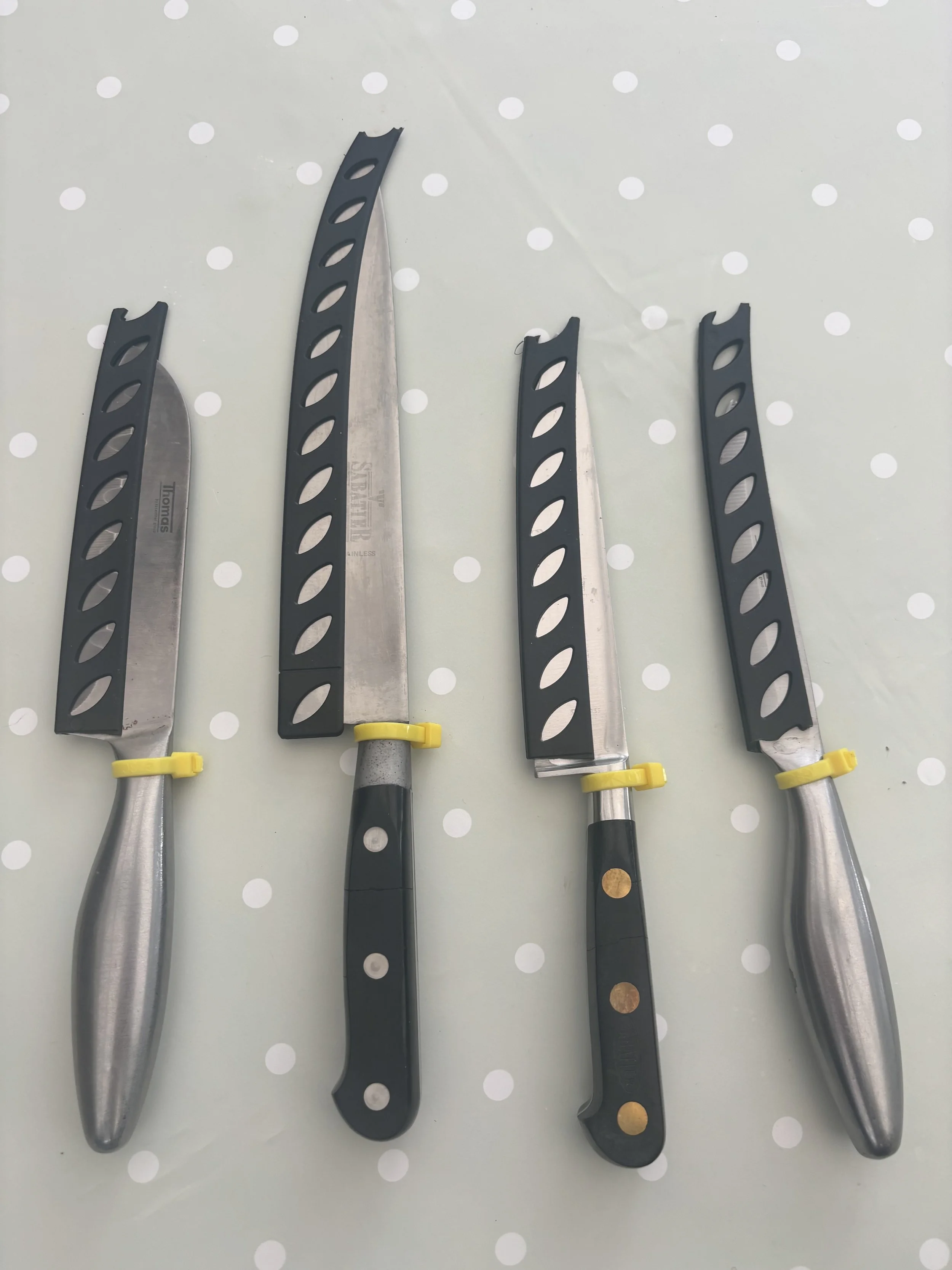Selection of 4 Sharpened Chef Knives with blade covers- Bramhall