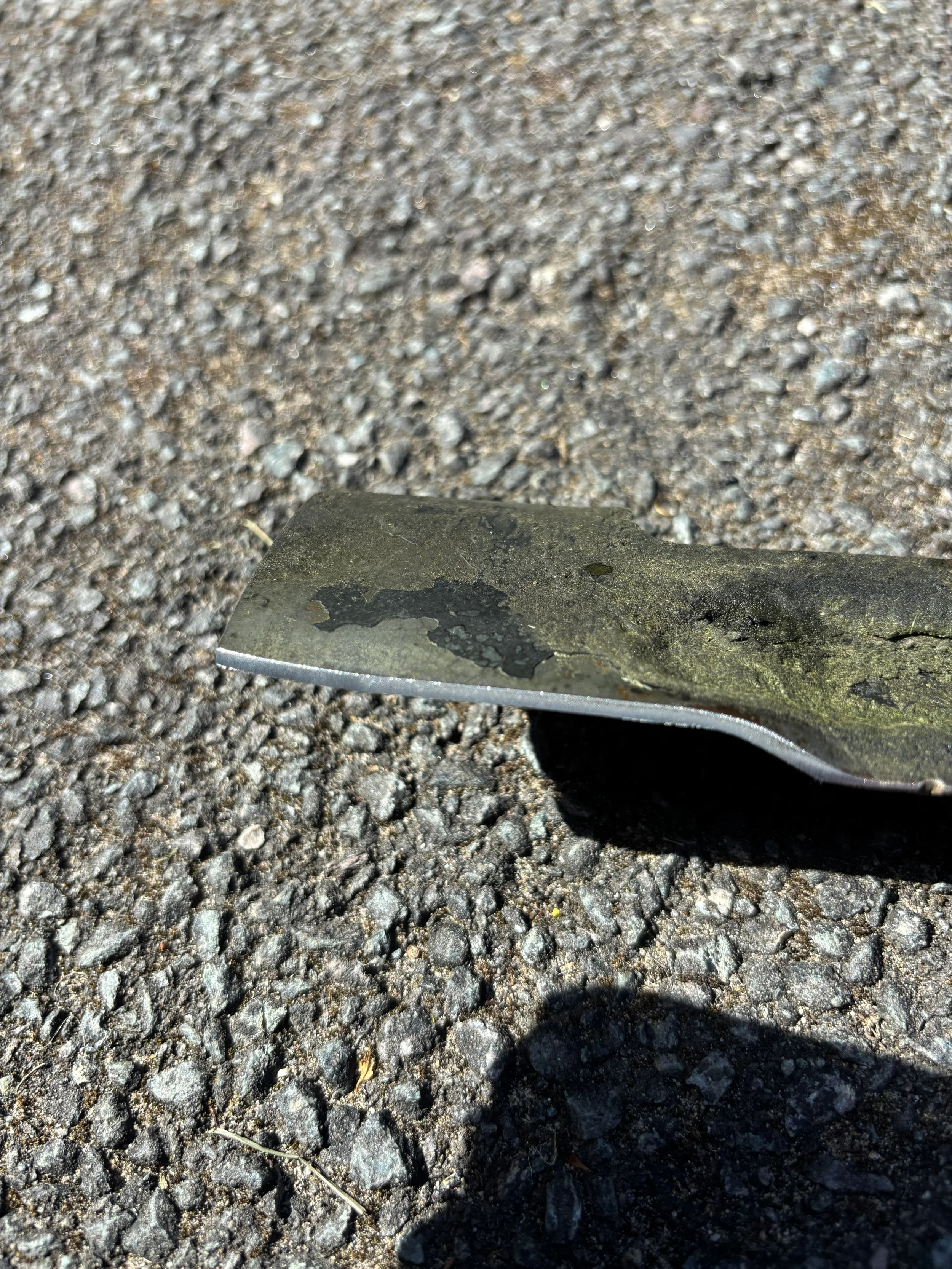 close up sharpened lawn mower blade to show the new edge |  Poynton, Stockport, Greater Manchester, Cheshire East, SK12