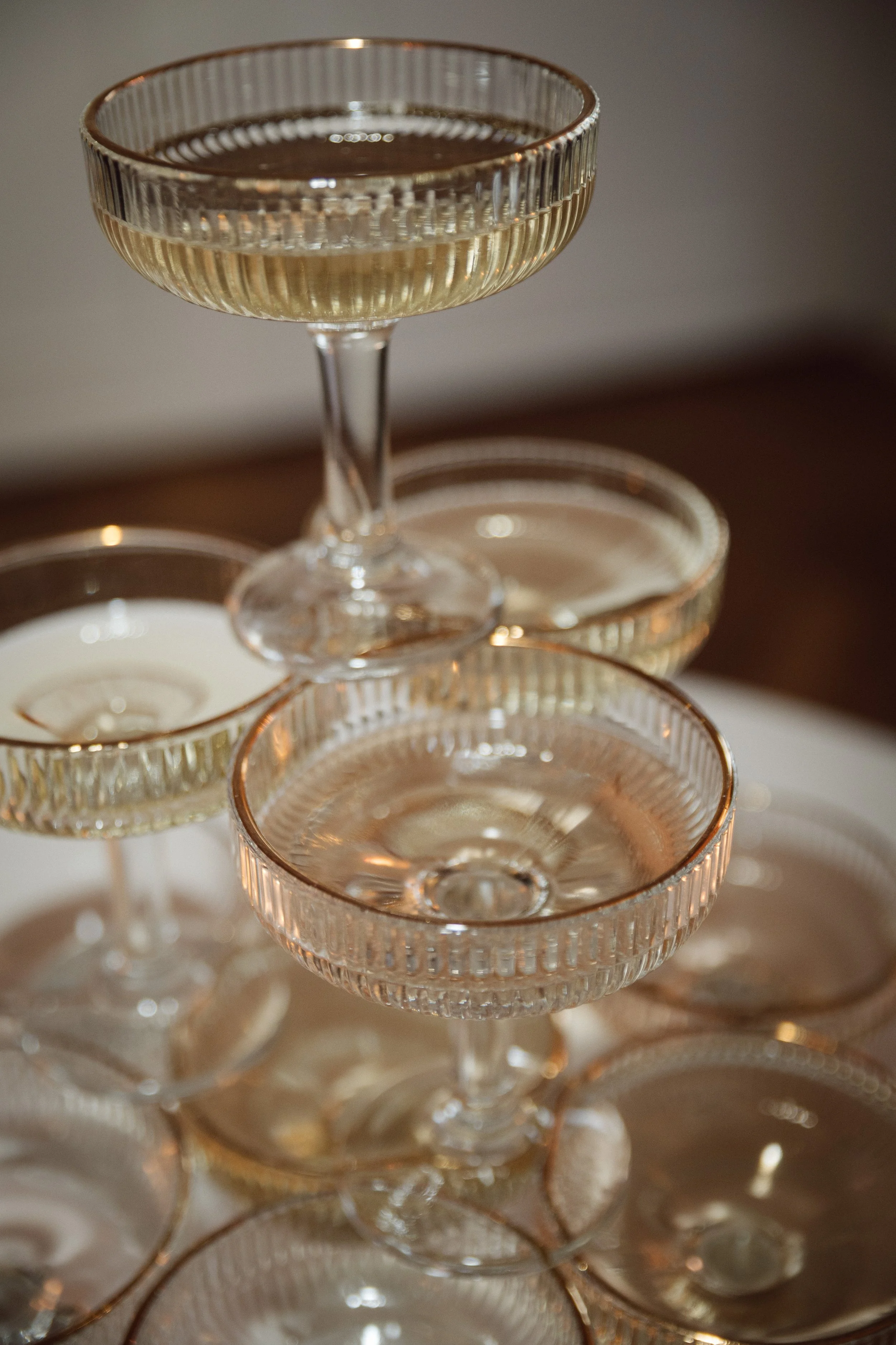 Close up of a champagne tower at a wedding ceremony.
