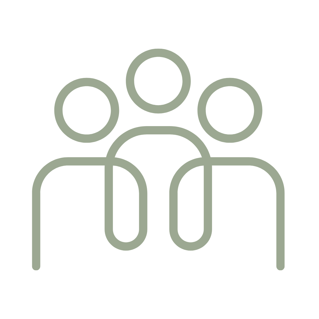 Icon of three people sitting at a table, representing a group or team.