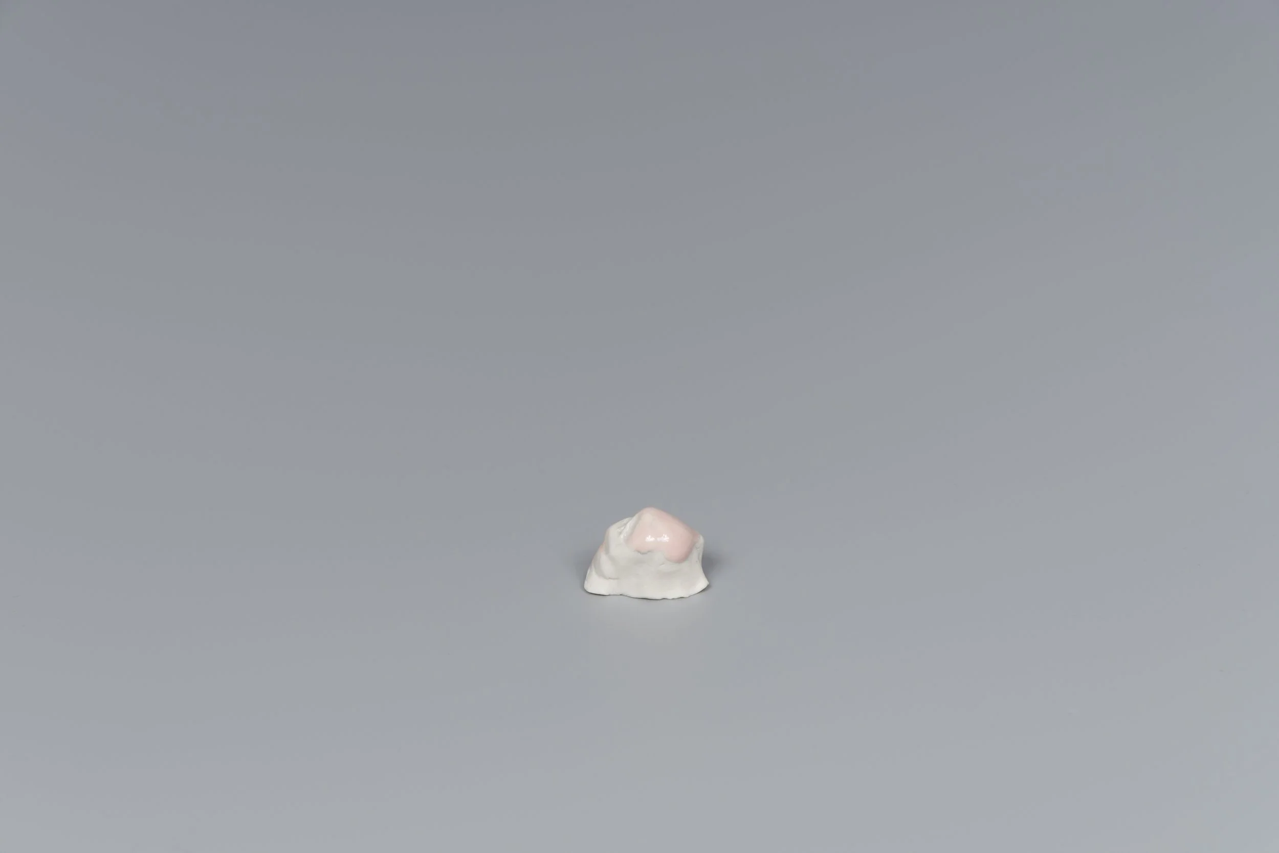 Haw Par Villa Little Rocks #21, underglaze, bisque fired porcelain, approx. 1 x 1.5cm