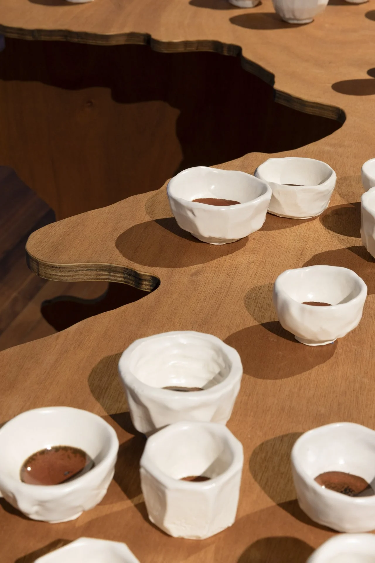 If I don’t finish my tea, could I remember you?, Jess Bradford & Louise Zhang, 2023, Plywood, Tasmanian oak, glazed porcelain, approx 105 x 206 x 133cm.