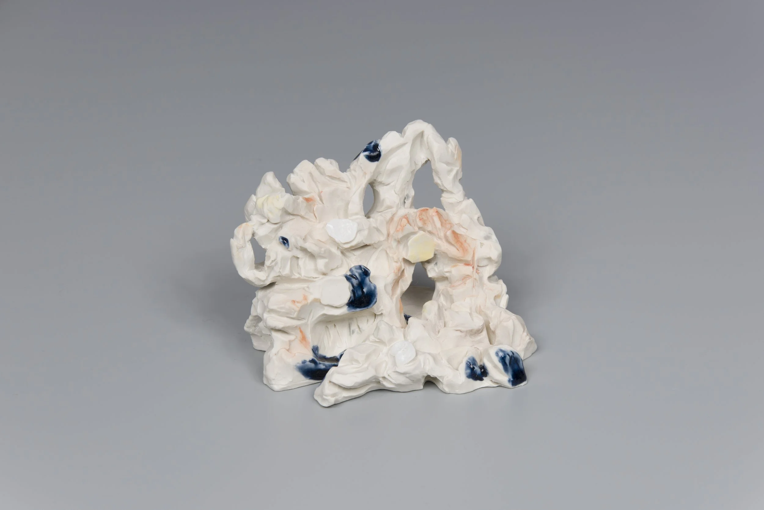 Haw Par Villa Rock Study #34 (Rockpool), 2022, glazed porcelain with pastel and oil paint, 9 x 13 x 10.5 cm