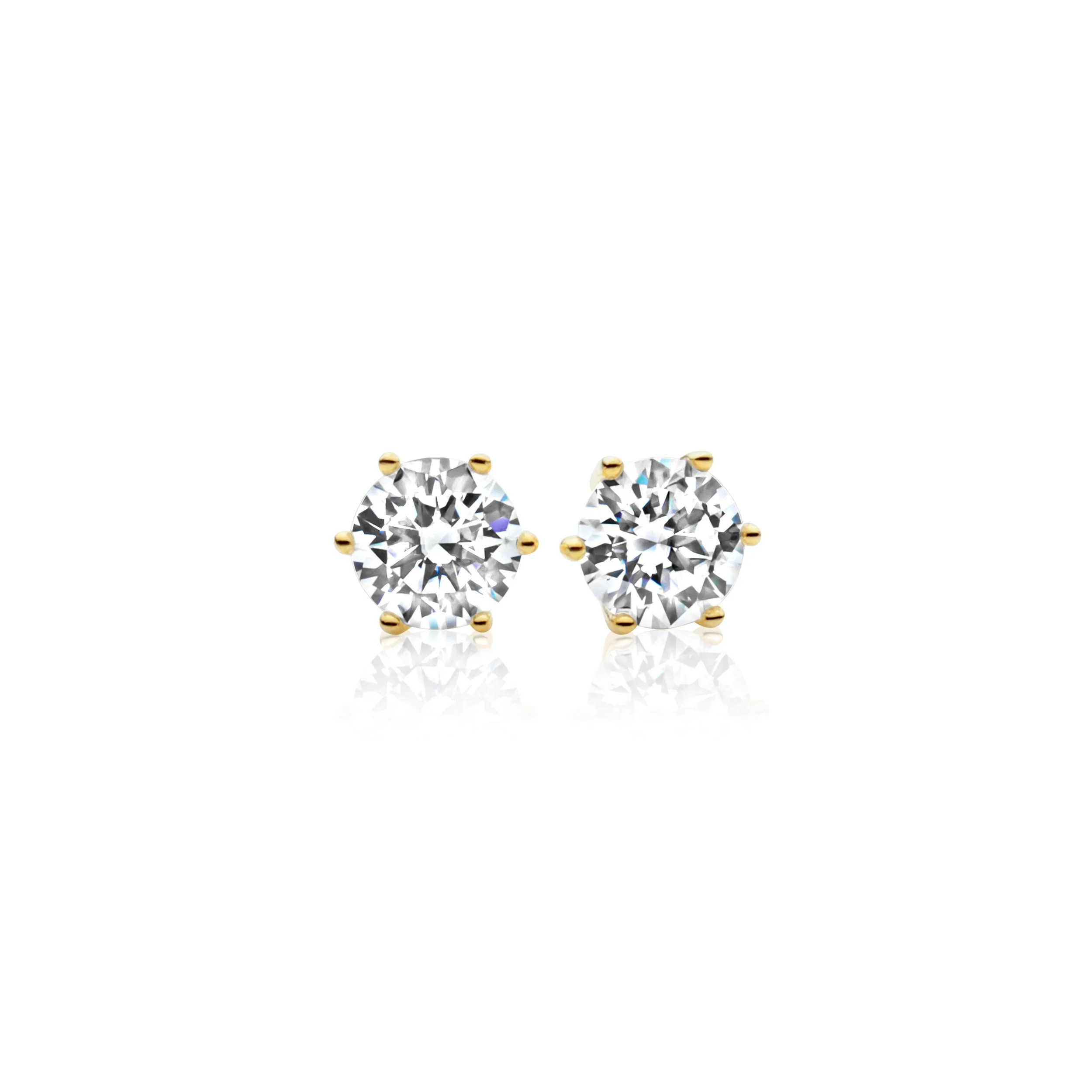 Professional jewelry picture of a pair of diamond stud earrings set in yellow gold