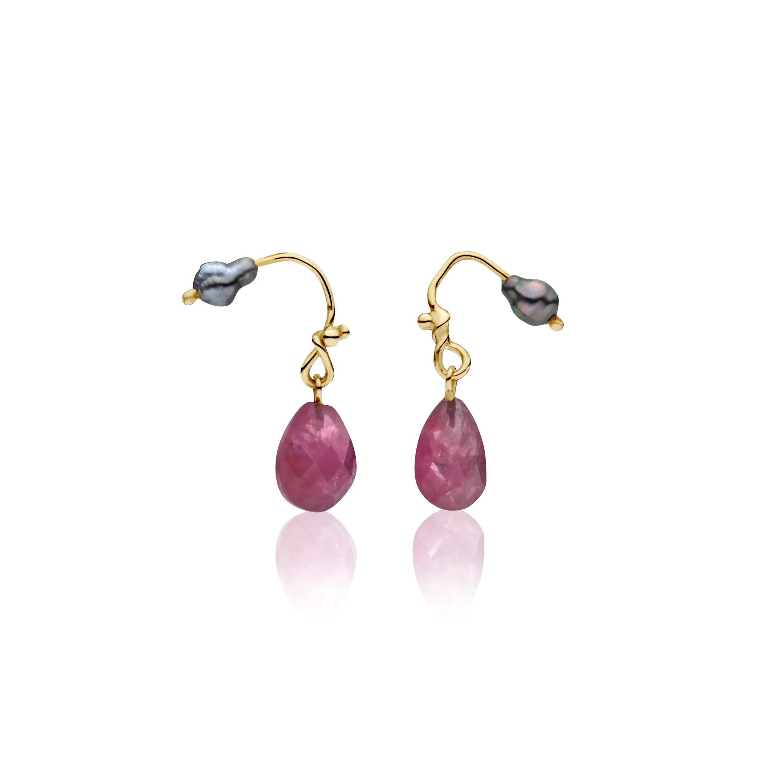 Professional jewelry picture of Gold earrings with pink teardrop-shaped gemstones and baroque pearls.