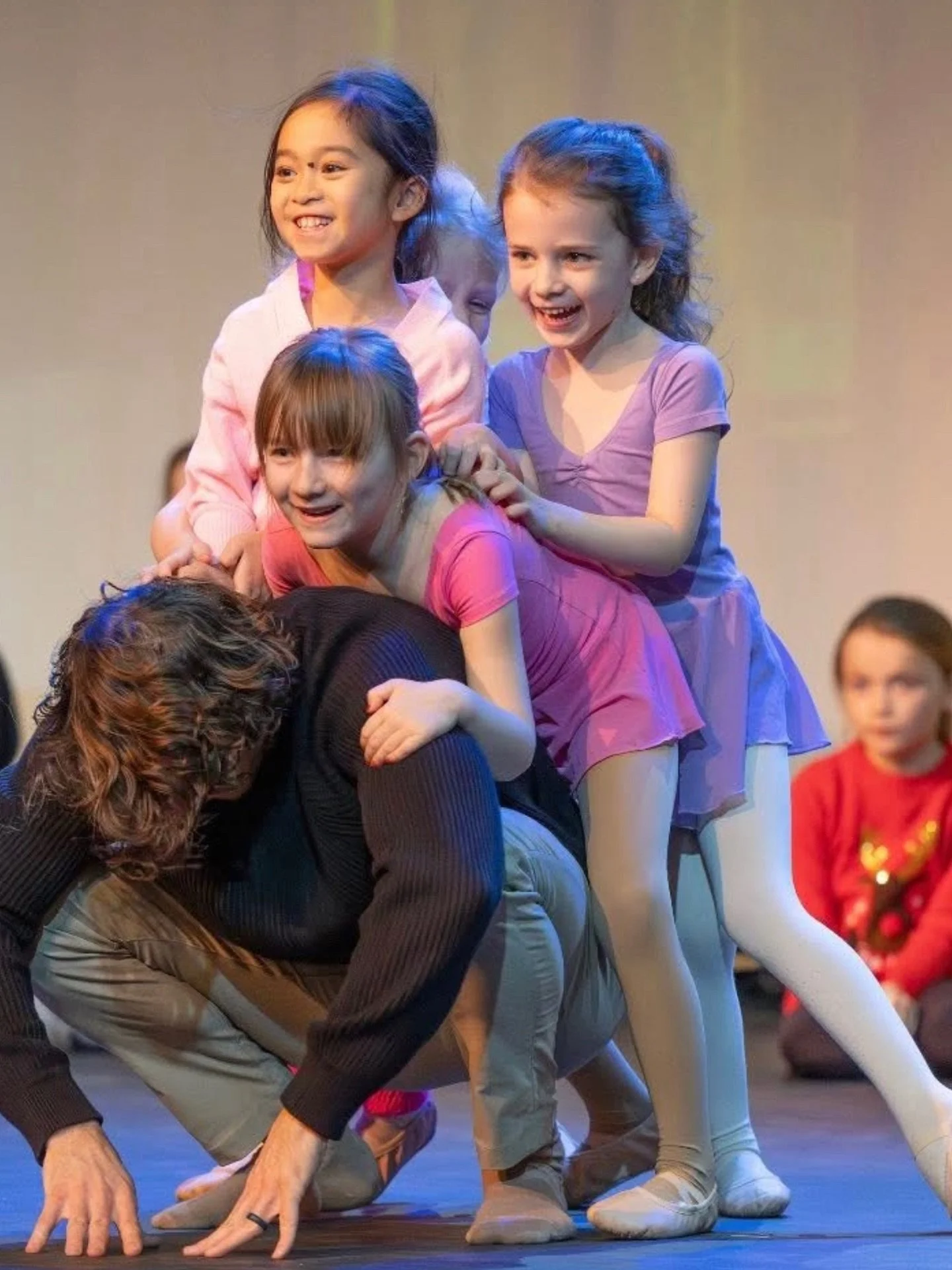 Today we&rsquo;re back at it and we can&rsquo;t wait to see these smiling faces. Pictured here our dancers are in rehearsals on stage for The Nutcracker with guest artist @_caleb_allred_ as the Acro Bear. This is a memory they have forever, and conti