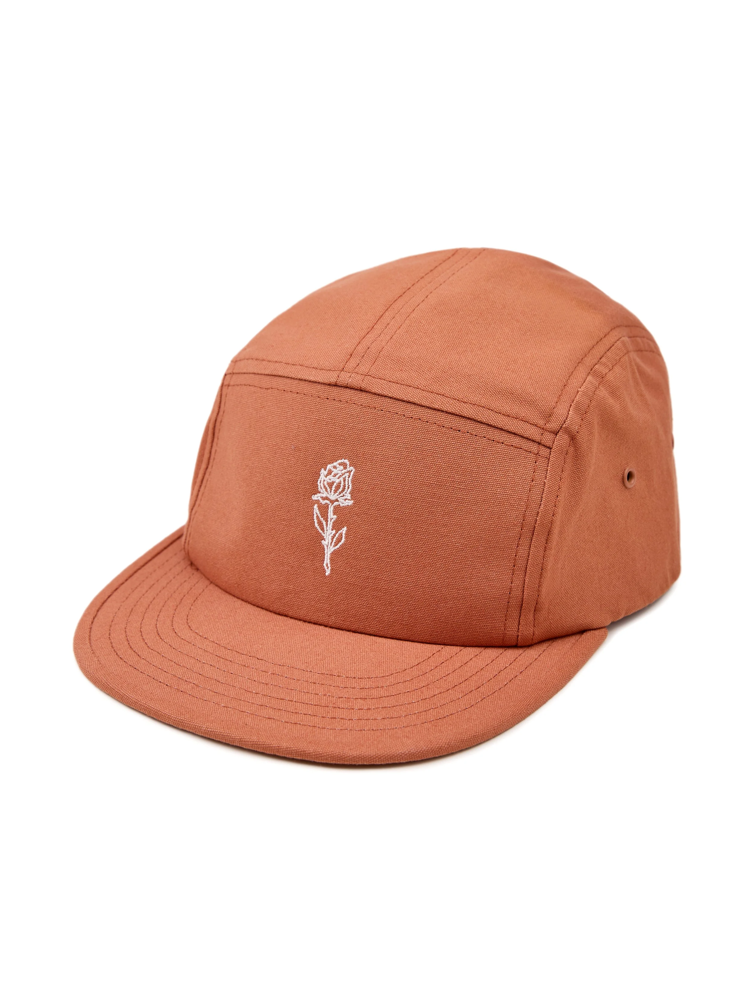 Terracotta-colored five-panel cap with white embroidered rose outline on front panel.