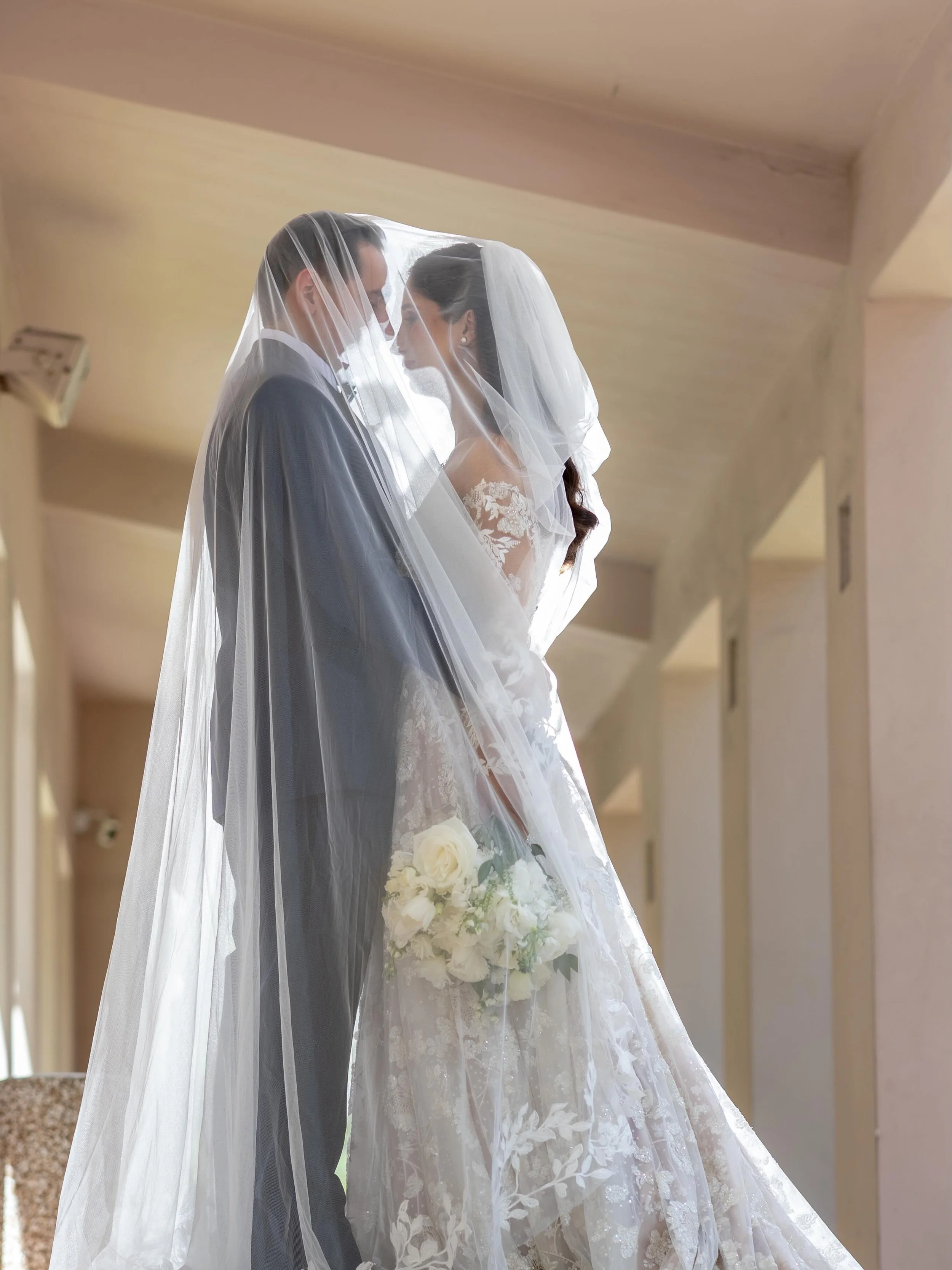 Crowned by faith, wrapped in love. ✨🤍👑

A day filled with sacred vows, soft moments, and a love that feels timeless.

Rima &amp; Brian 4.18.26

@leophotographers 
@vieenblanc 
@julesflemingartistry1 
@menswearhouse 
@chiara.flowers 
@oberlincaterin