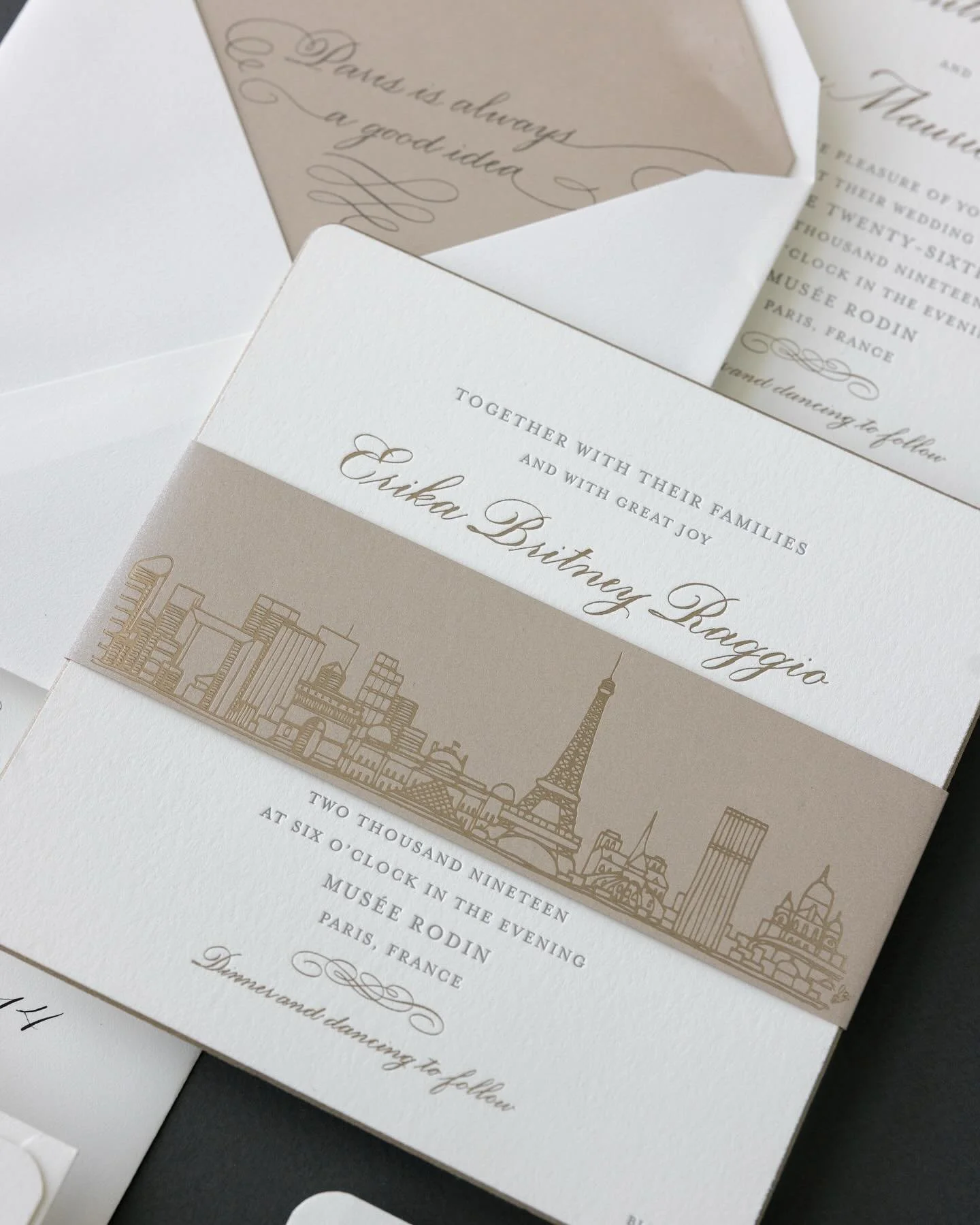 Paris is always a good idea. 🇫🇷 Grey letterpress and pops of champagne 🍾 with stunning calligraphy to set the tone. A favorite from years past with @grodesigns @nicoleblackcalligraphy and styled and shot by @sarahkatephoto