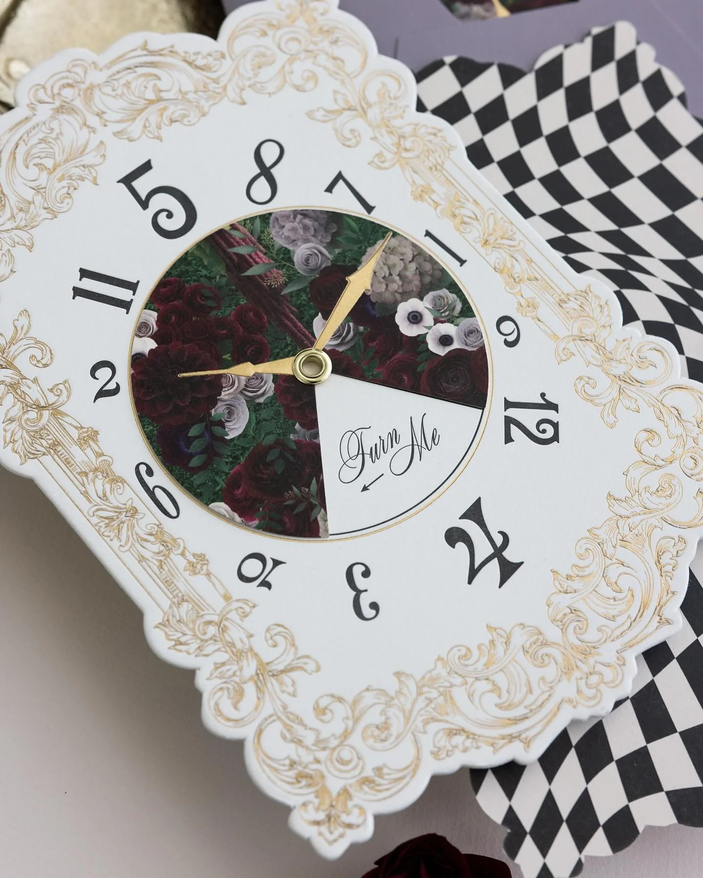 Turn the dial and swipe and follow us down the rabbit hole to see this jaw-dropping, trippy, topsy-turvy bridal luncheon come together, from our clock invitations to every single incredible detail created by this talented team. &spades;️&hearts;️&clu