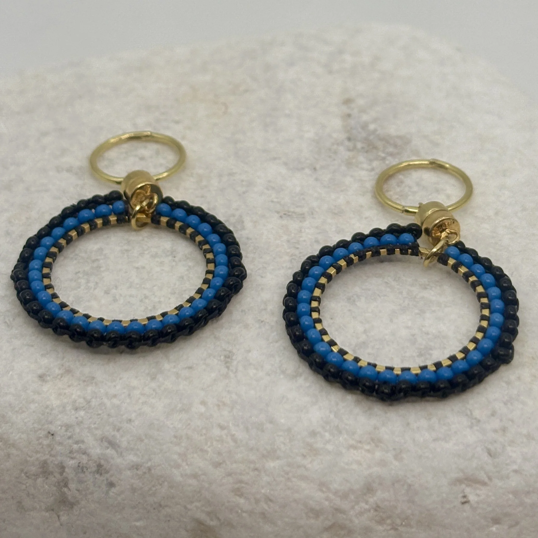 Small circle bright blue and black
