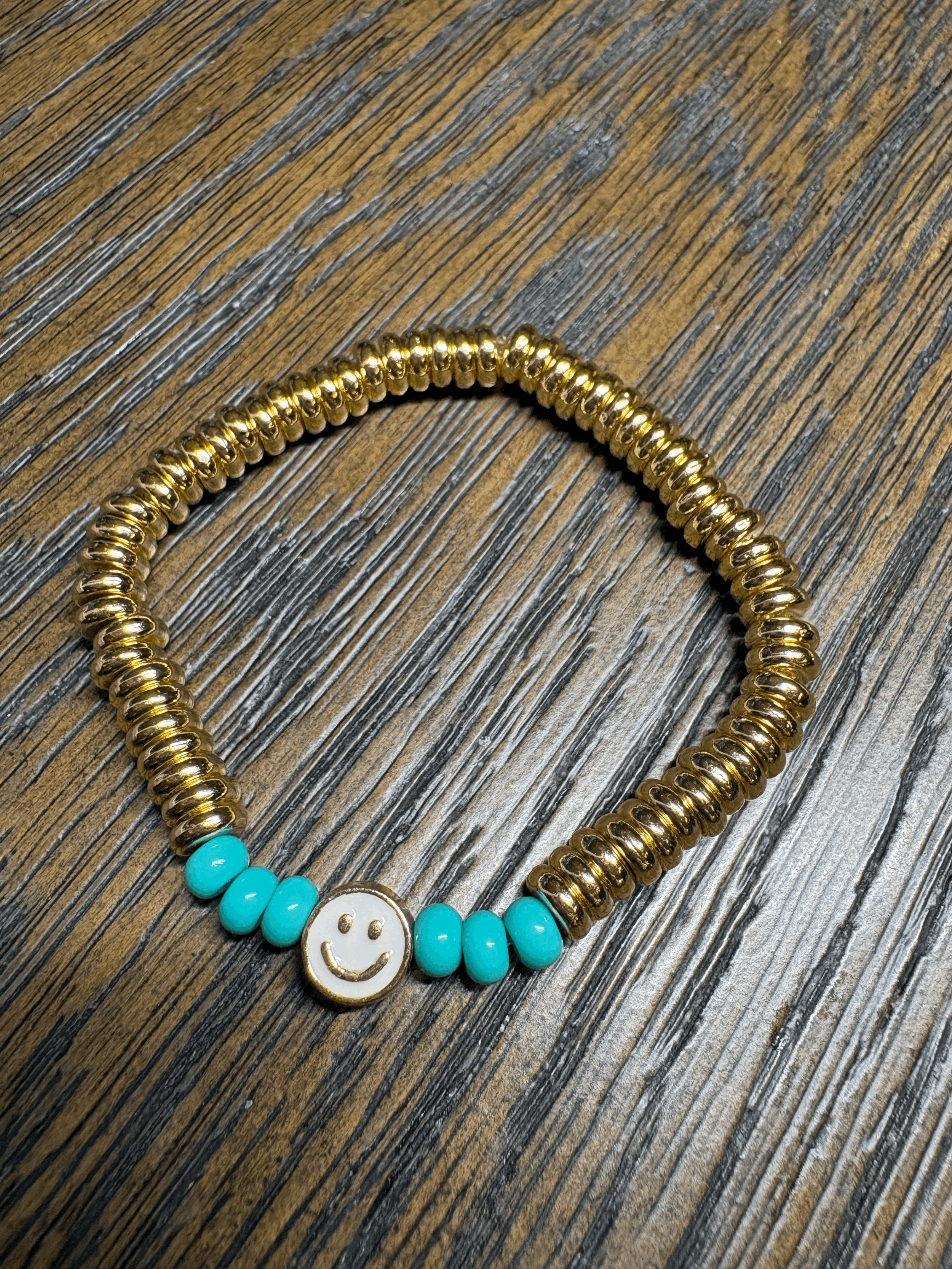 Gold sweetie bracelet with turquoise beads