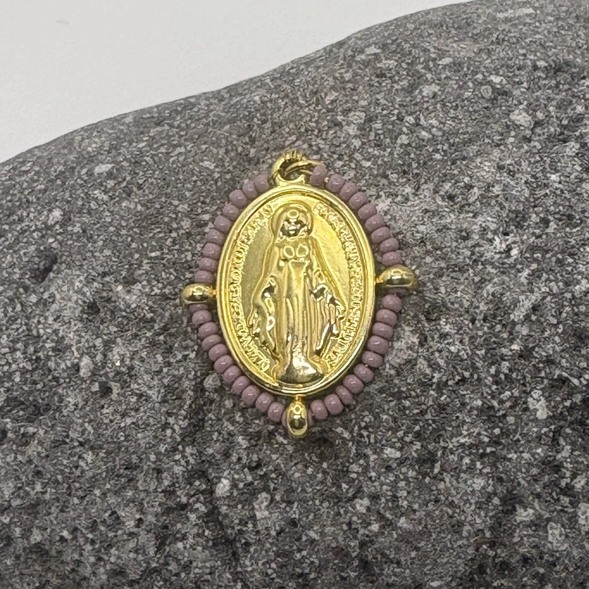 Oval 18K gold plated Virgin Mary charm with a Mauve bead surround