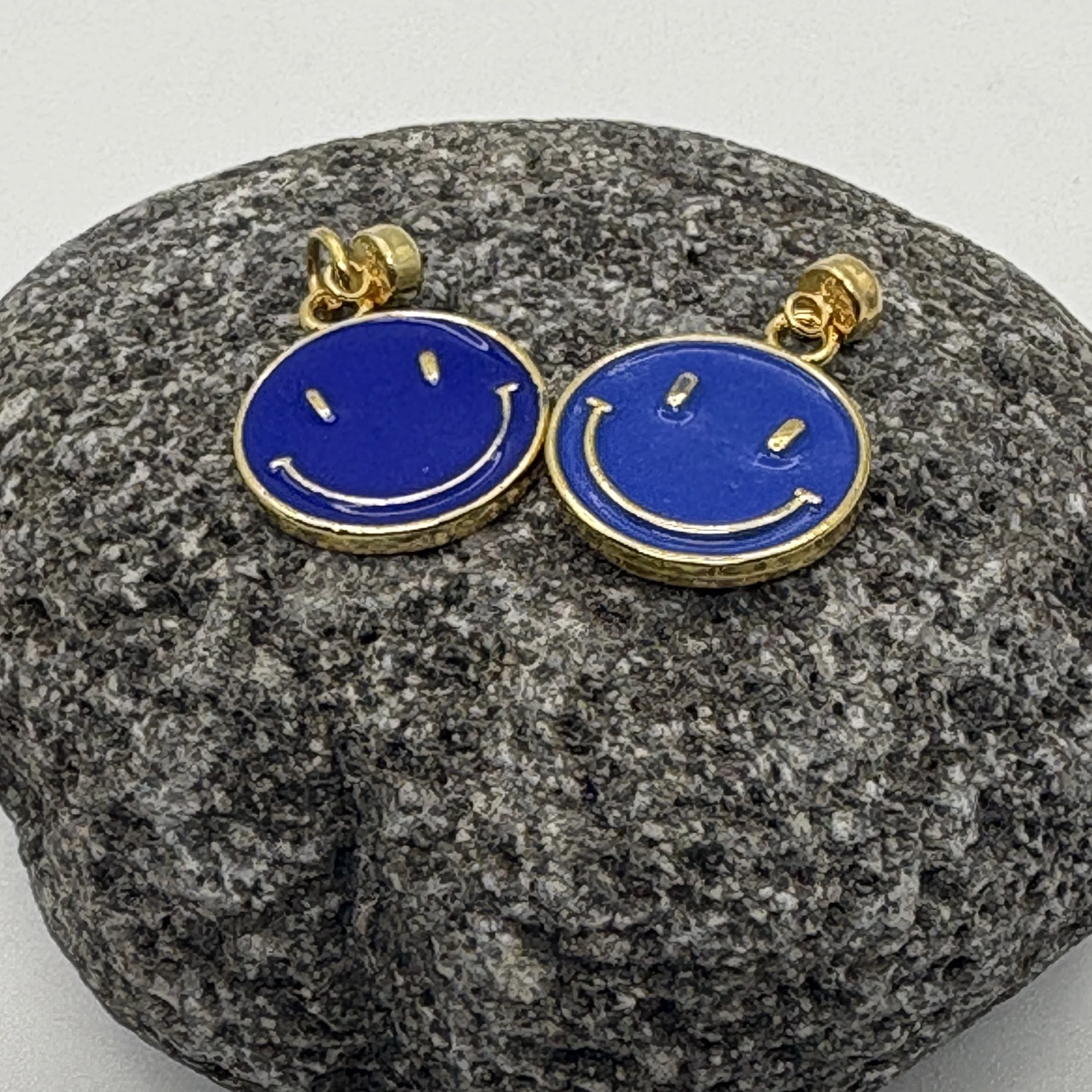 Blue happy face charm