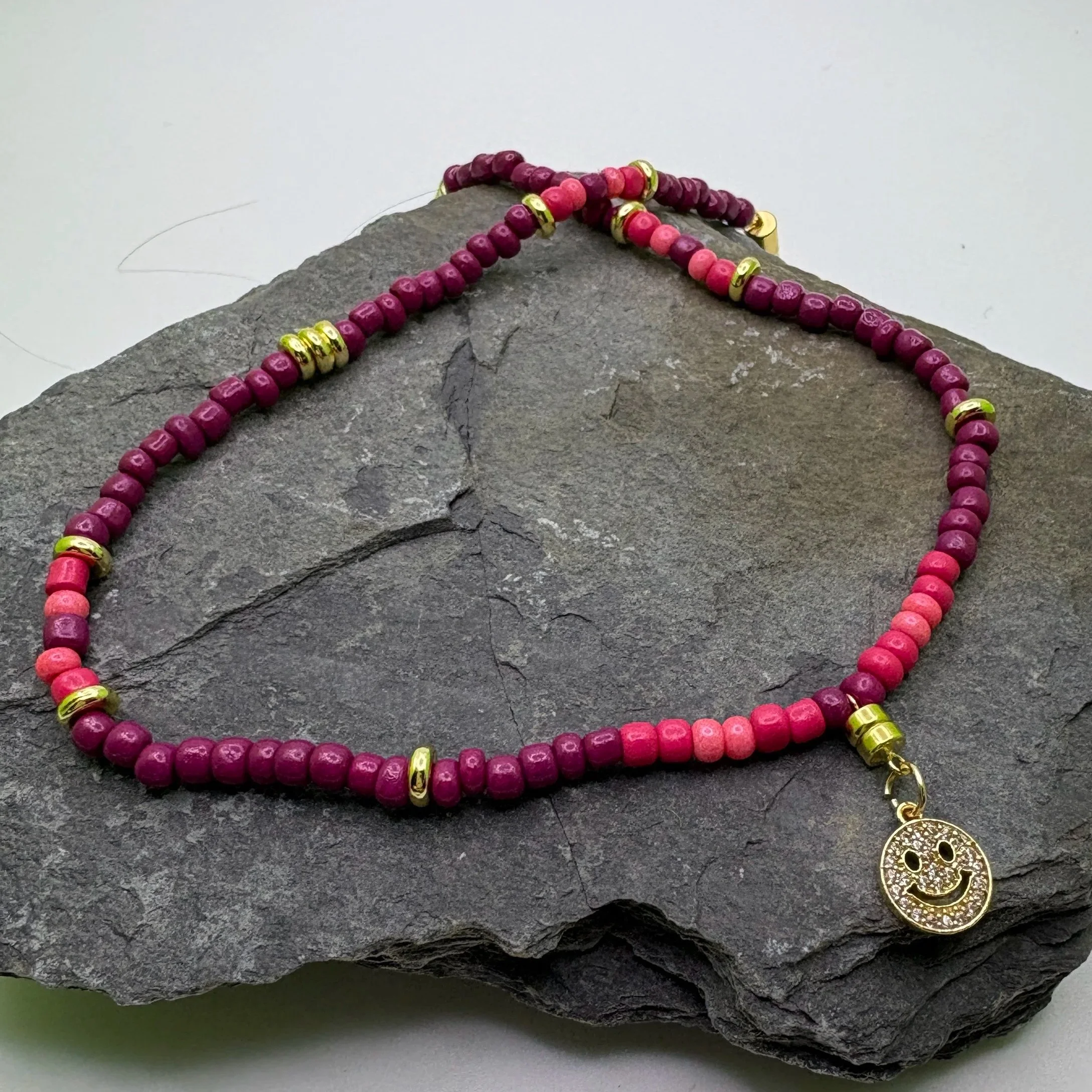 Plum, pink, coral and gold necklace