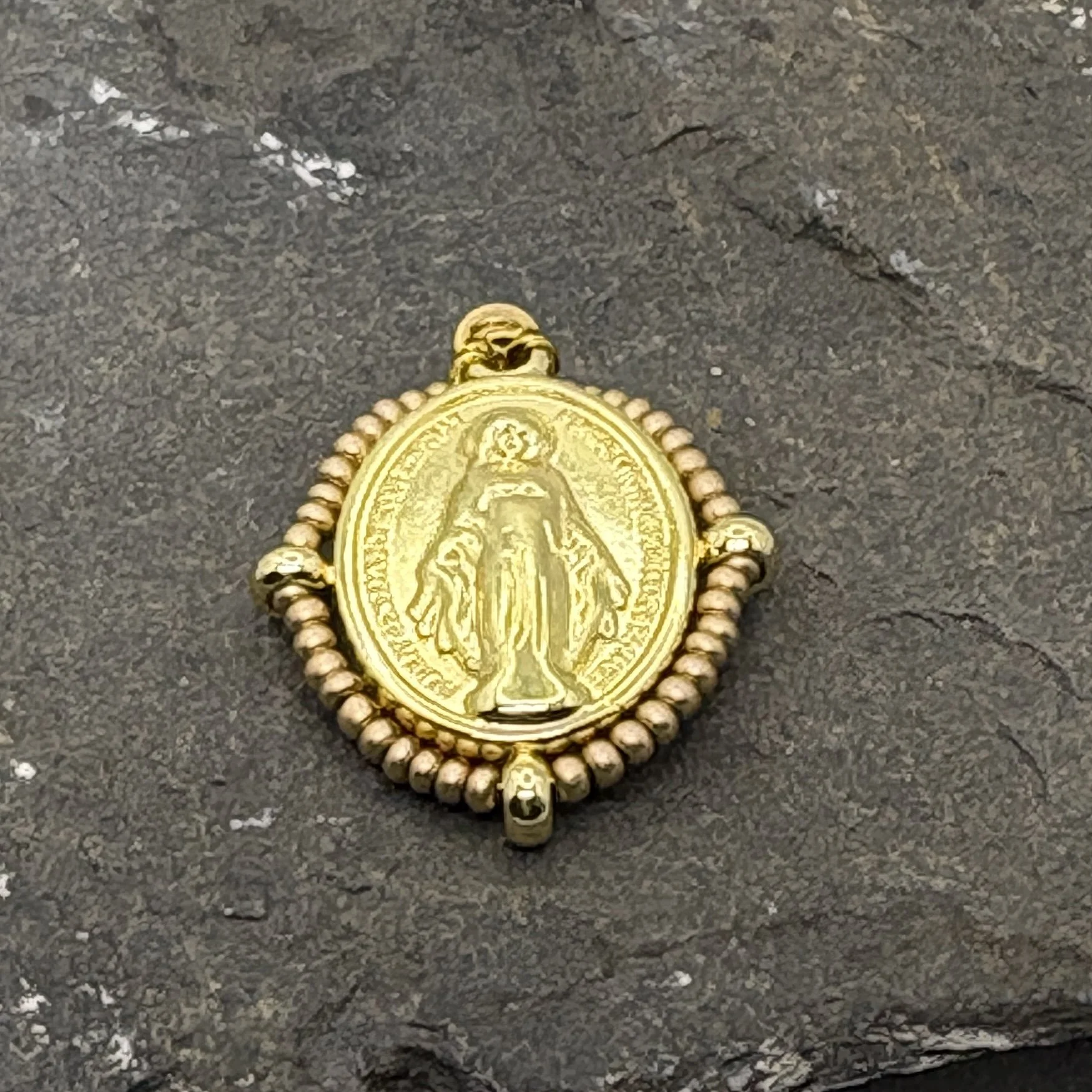 Oval 18K gold plated Virgin Mary charm with a gold bead surround
