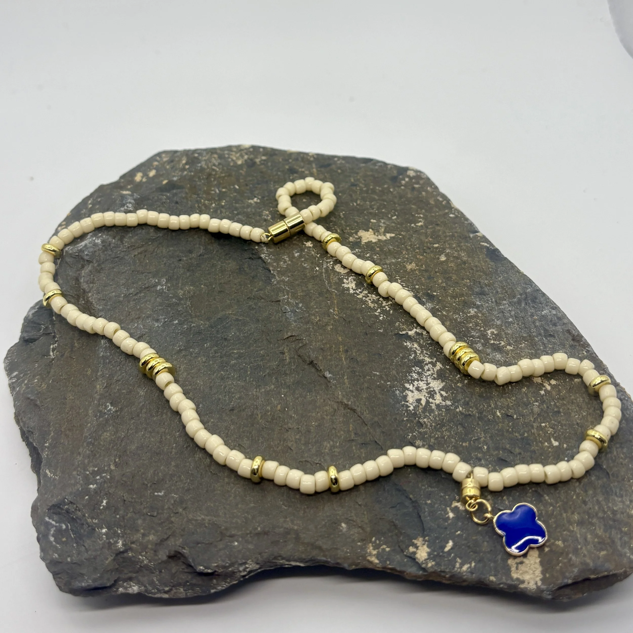 Cream and gold necklace