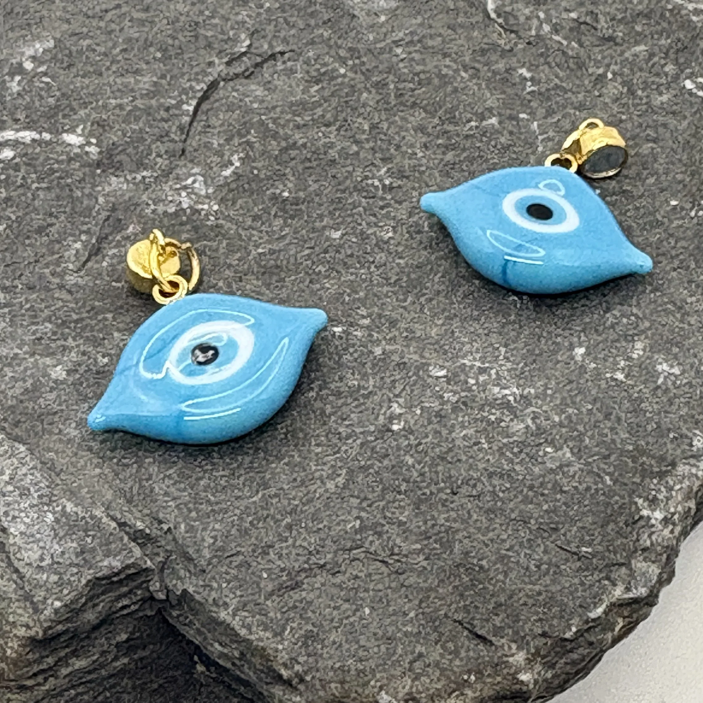 Blue glass eye charm