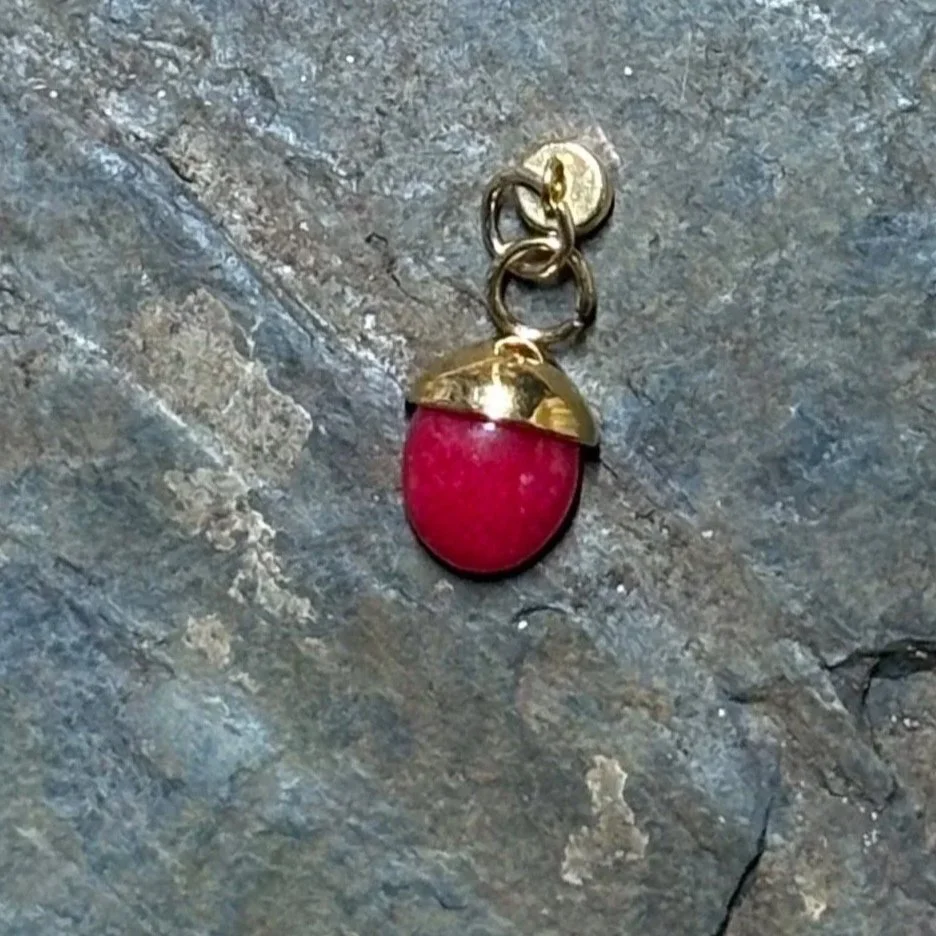 Red acorn stone charm