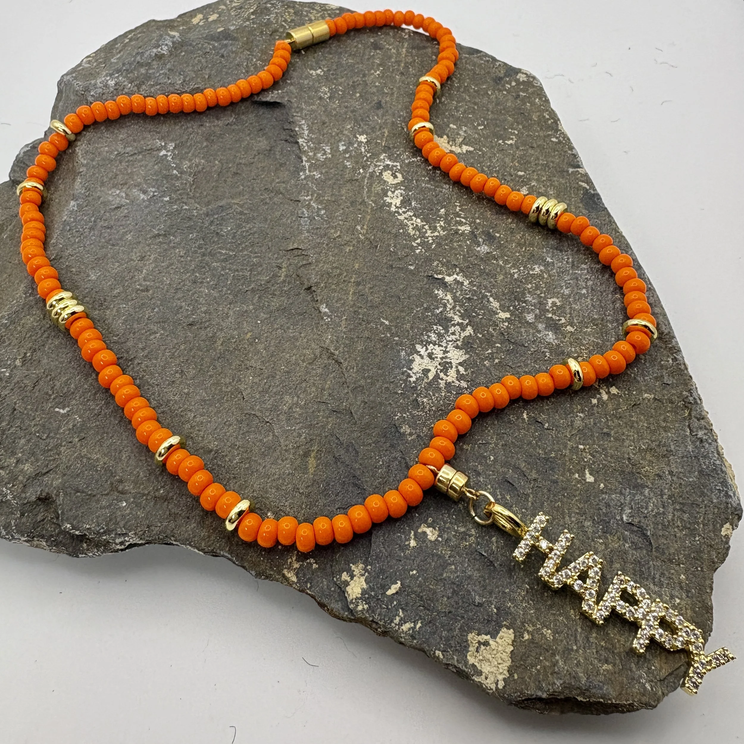 Orange and gold necklace