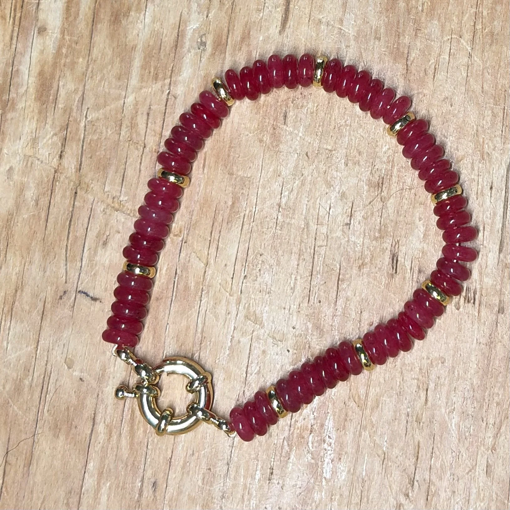 Red glass bead bracelet with bolt clasp