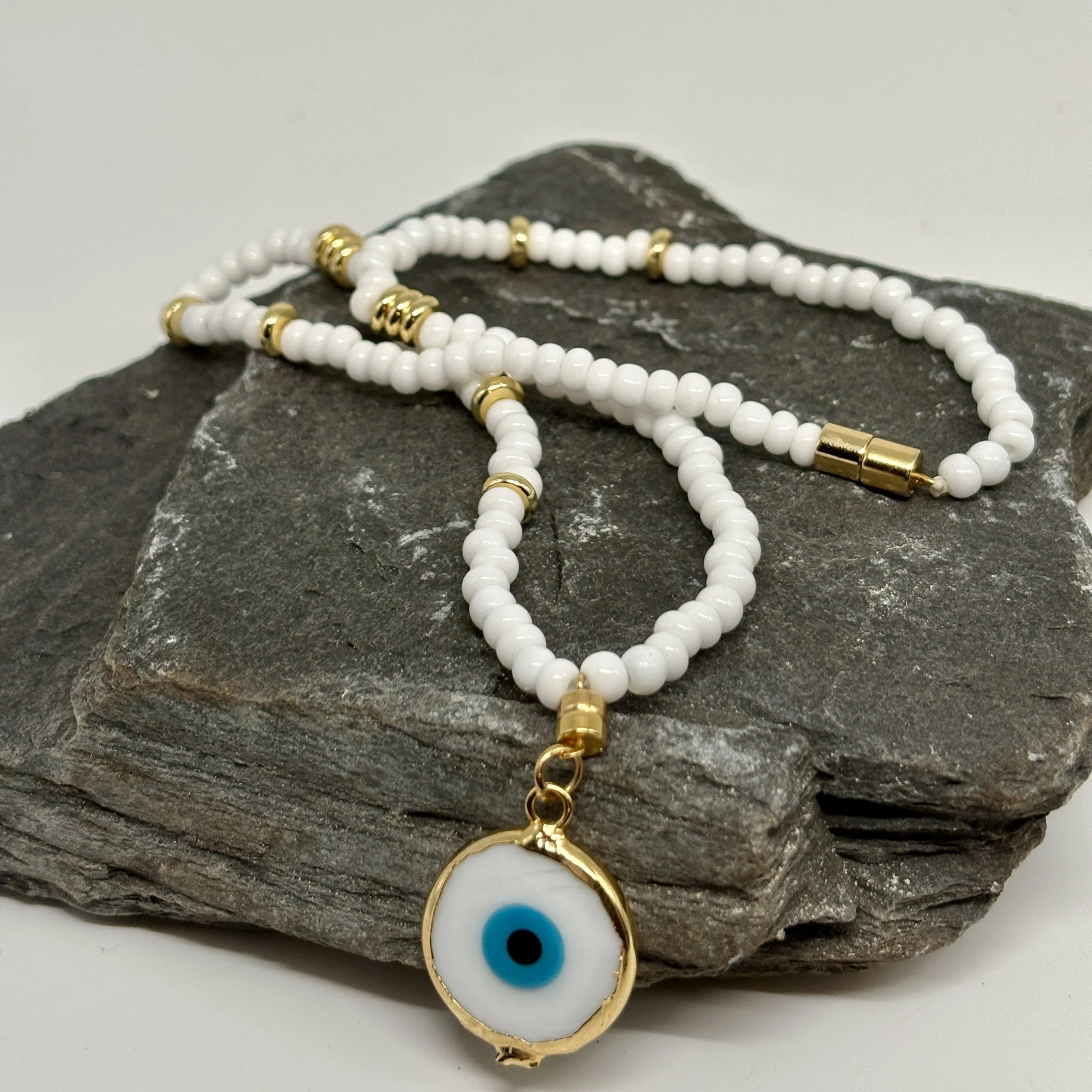 White and gold necklace