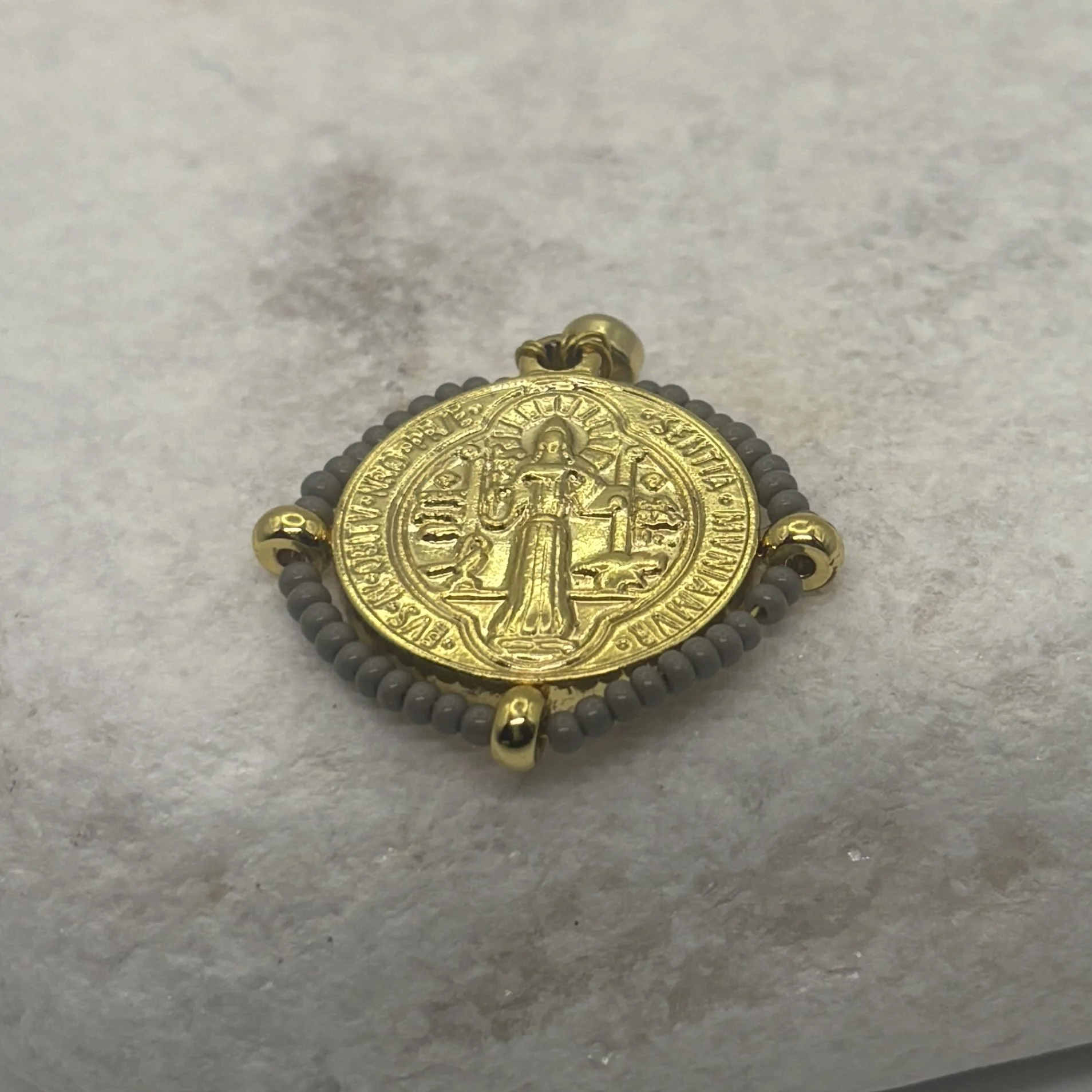 Round 18K gold plated St Benedict Charm with grey glass bead